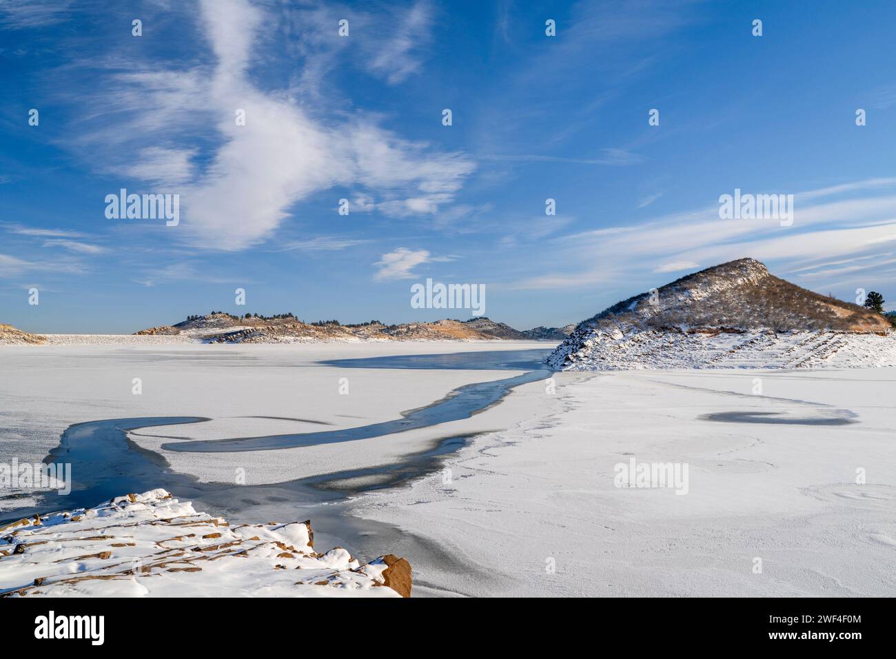 winter scenery of northern Colorado foothills - frozen Horsetooth Reservoir Stock Photo