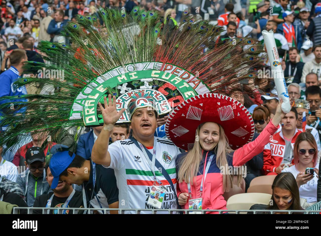 Moscow, Russia – June 14, 2018. Fans from Mexico and Russia during the opening match of FIFA World Cup 2018 Russia vs Saudi Arabia (5-0). Stock Photo