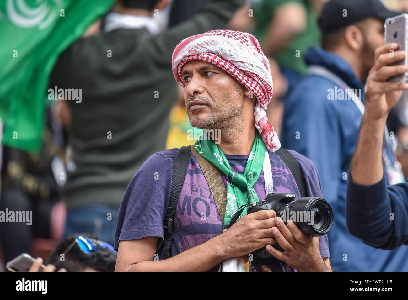 Moscow, Russia – June 14, 2018. Fan from Saudi Arabia, wearing shemagh, with a camera, during the opening match of FIFA World Cup 2018 Russia vs Saudi Stock Photo