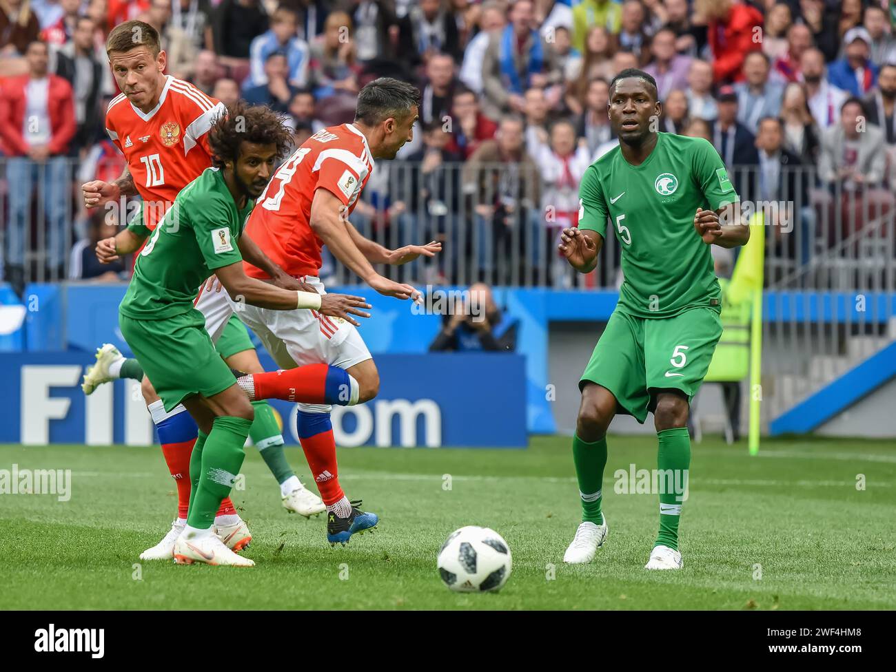 Moscow, Russia – June 14, 2018.  Players Fedor Smolov, Yasser Alshahrarani, Alexander Samedov and Omar Hawsawi during the opening match of FIFA World Stock Photo