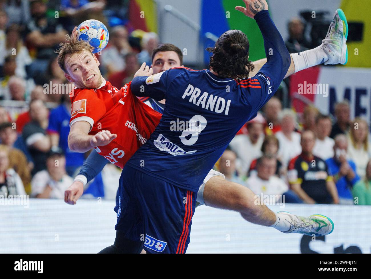 Denmark's Mathias Gidsel and France's Elohim Prandi during the final between Denmark and France in the Lanxess Arena in Cologne, Sunday, January 28, 2024. (Photo: Liselotte Sabroe/Ritzau Scanpix) Stock Photo