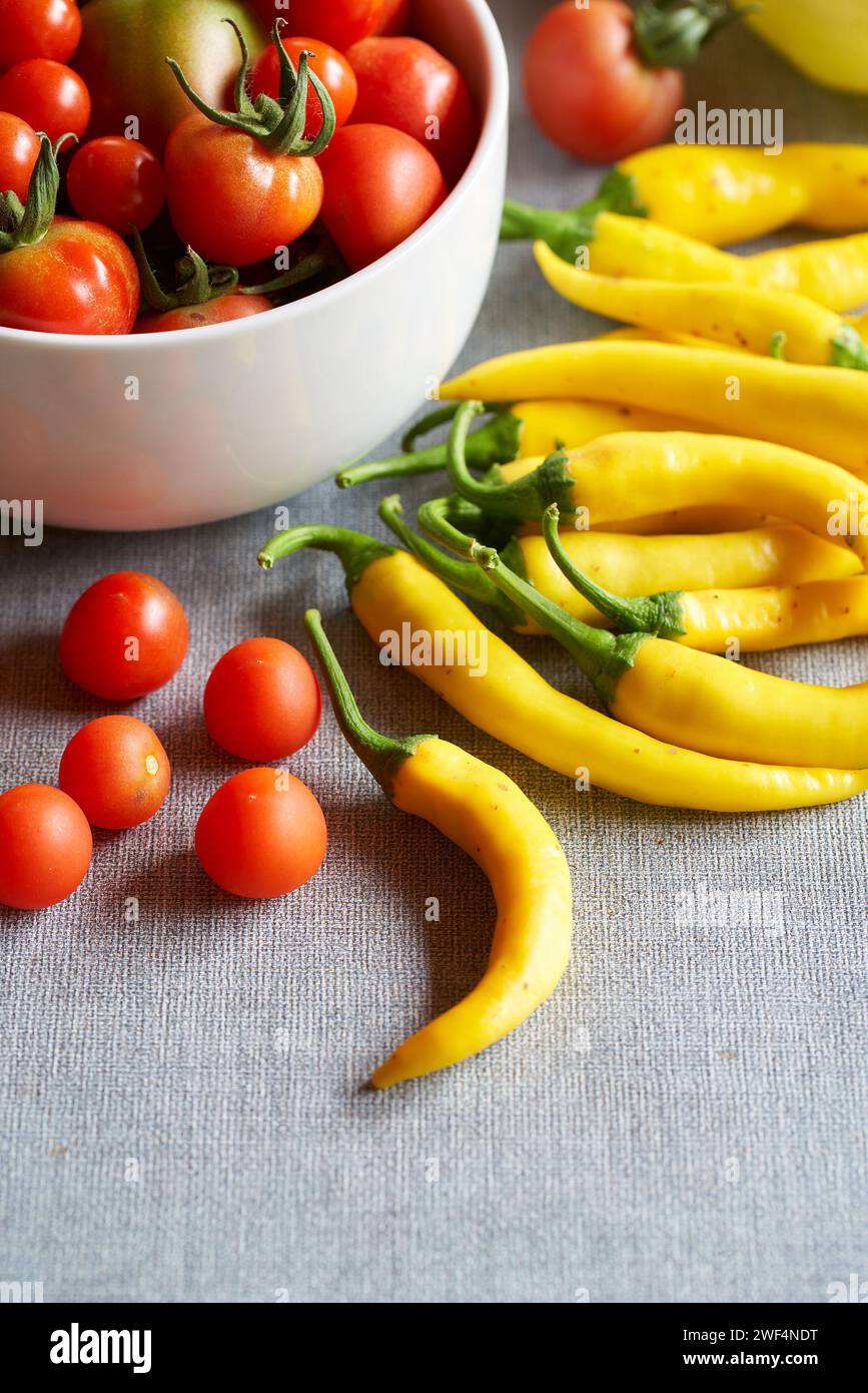 Healthy homemade bio tomatoes and chilli peppers Stock Photo
