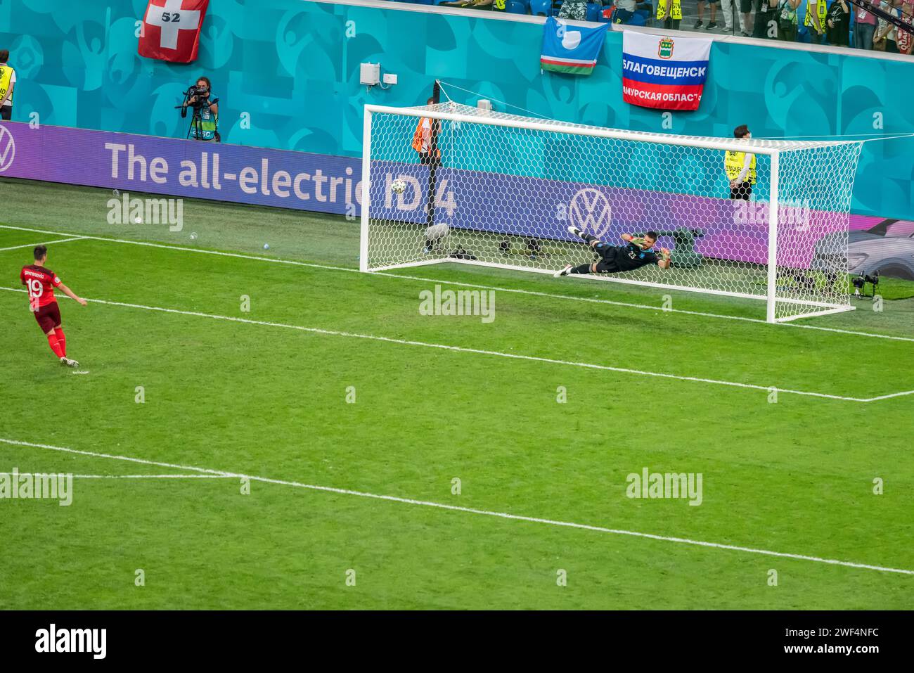 Saint Petersburg, Russia – July 2, 2021. Switzerland striker Mario Gavranovic scoring a penalty during penalty shootout in EURO 2020 quarterfinal Swit Stock Photo