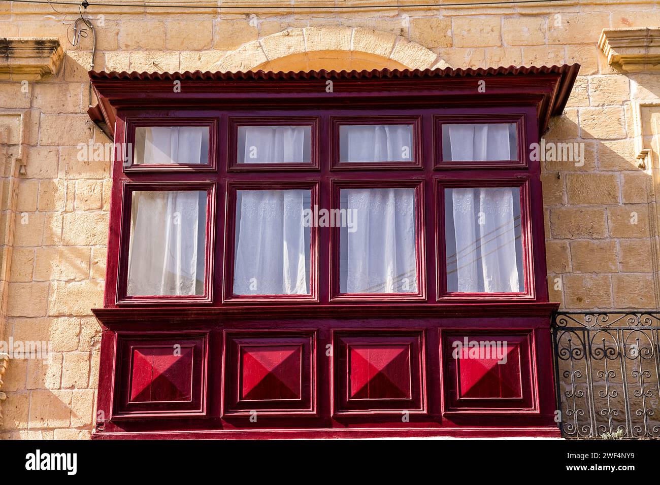 Gallarija, closed balconies, typical of Malta, red in colour Stock Photo