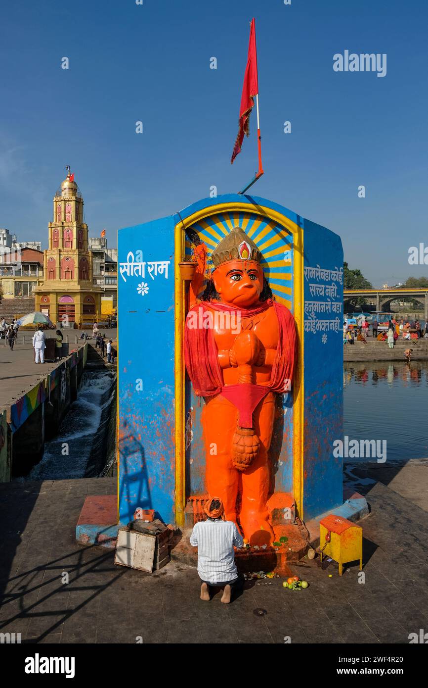 Nashik, India January 25, 2024 A man praying at the Ganga Ghat in