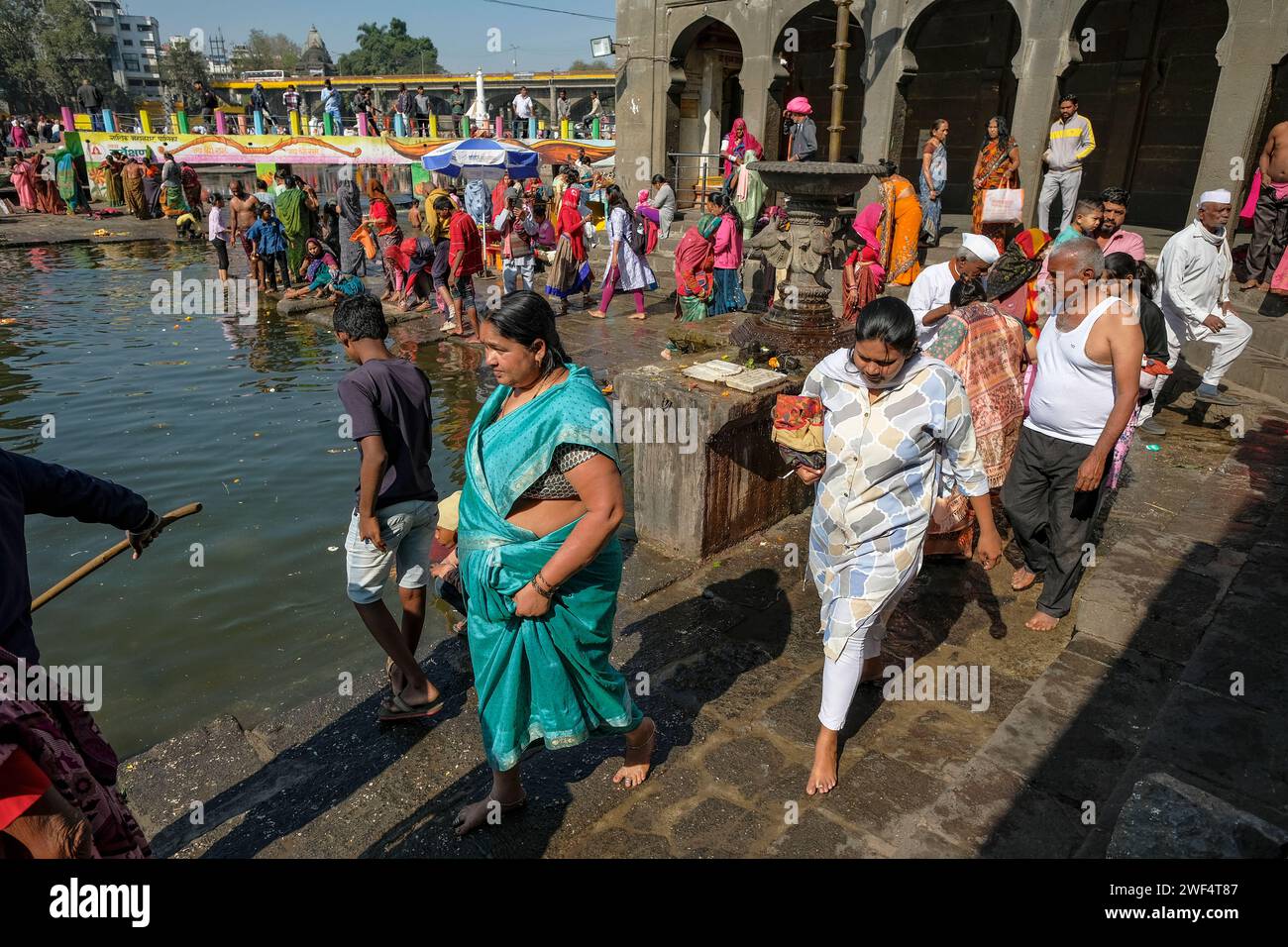 Nashik, India January 25, 2024 People making offerings at the Ganga