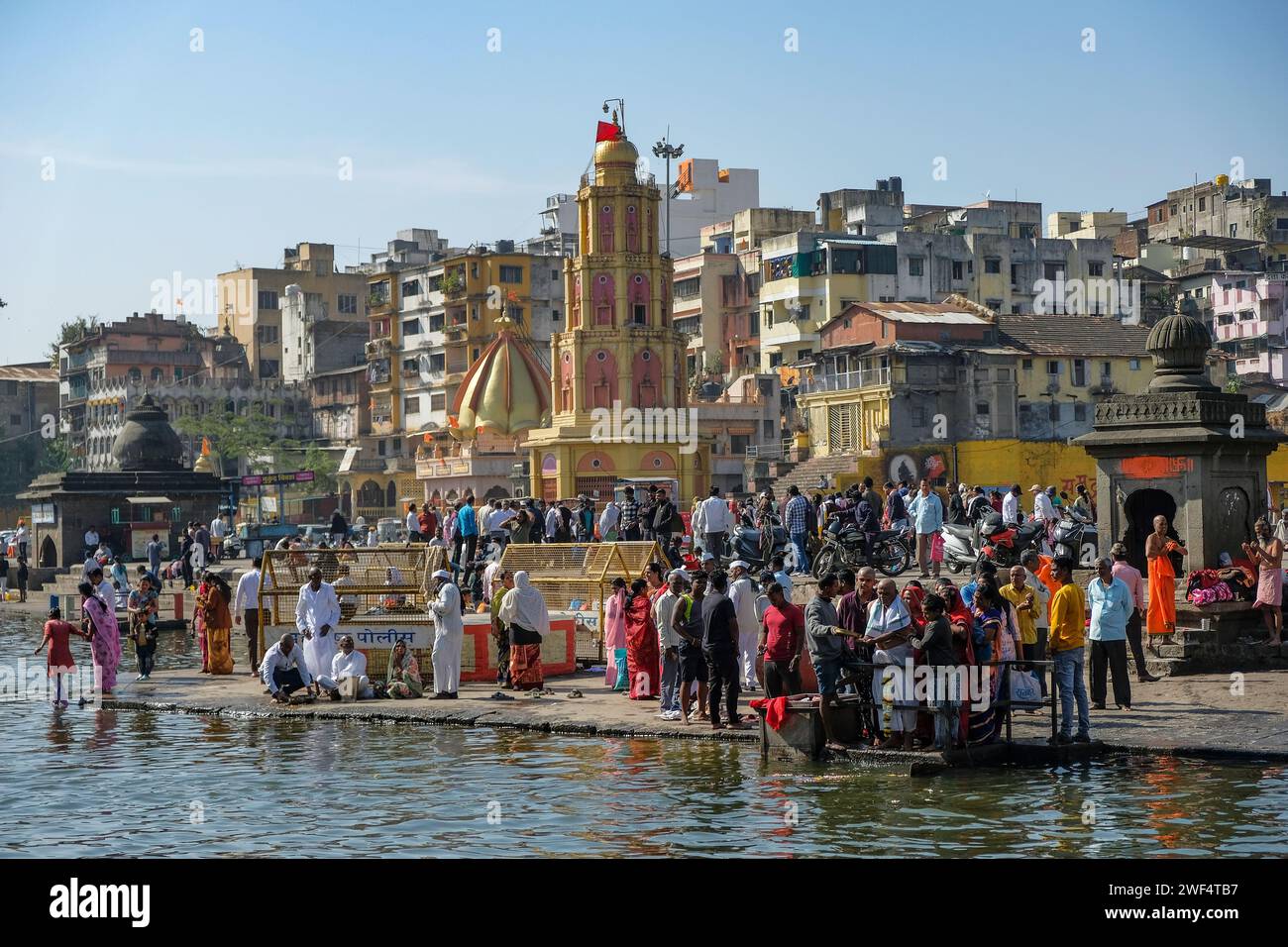 Nashik, India January 25, 2024 People making offerings at the Ganga