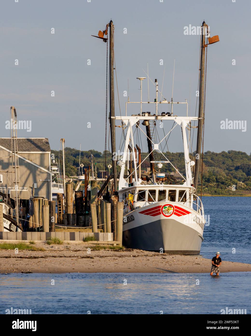 The commercial fishing Boat is moored in the harbor at Montauk, Long Island. Stock Photo