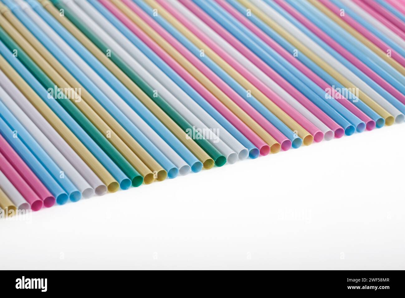 Colorful plastic straws isolated on white background Stock Photo