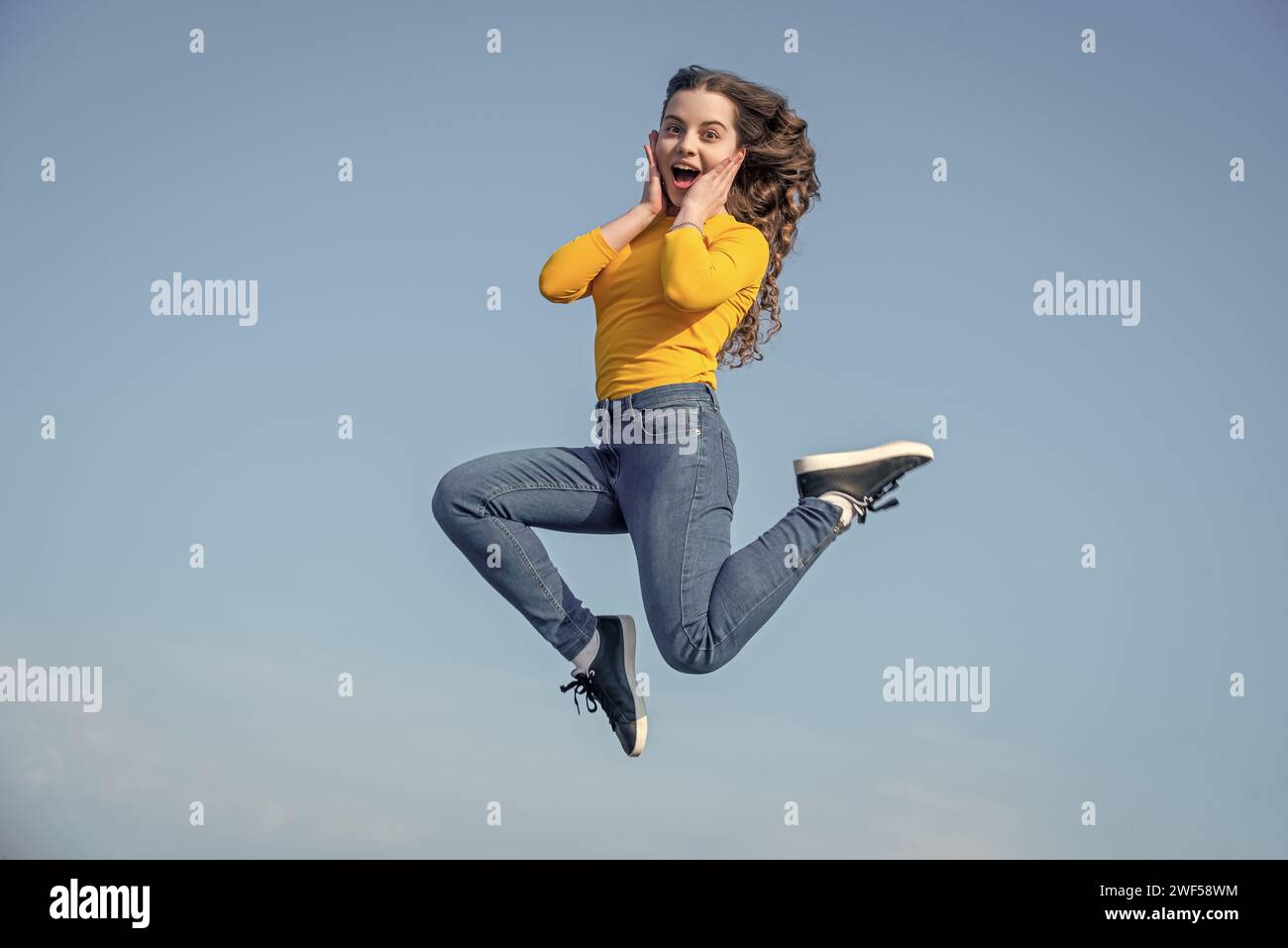 Happy teen girl rejoicing hi-res stock photography and images - Alamy