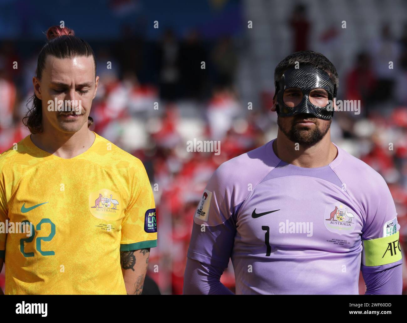 DOHA, QATAR - JANUARY 28:  Jackson Irvine and Mathew Ryan of Australia during the AFC Asian Cup Round of 16 match between Australia and Indonesia at J Stock Photo