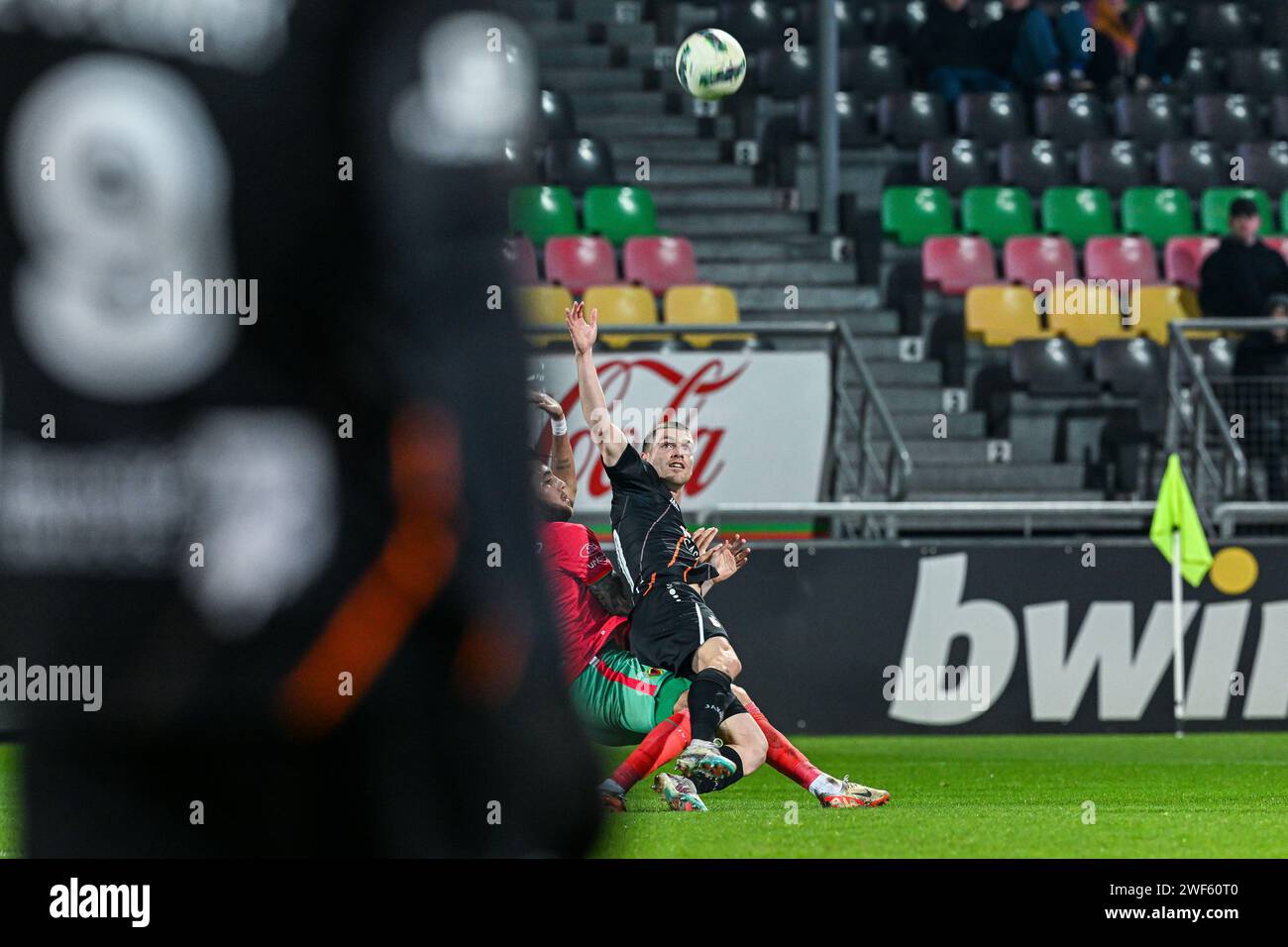 Oostende, Belgium. 28th Jan, 2024. Daniel Perez (9) of Oostende and Gonzalo Almenara (77) of KMSK Deinze pictured during a soccer game between KV Oostende and KMSK Deinze19th matchday in the Challenger Pro League 2023-2024 season, on Sunday 28 January 2024 in Oostende, Belgium . Credit: sportpix/Alamy Live News Stock Photo