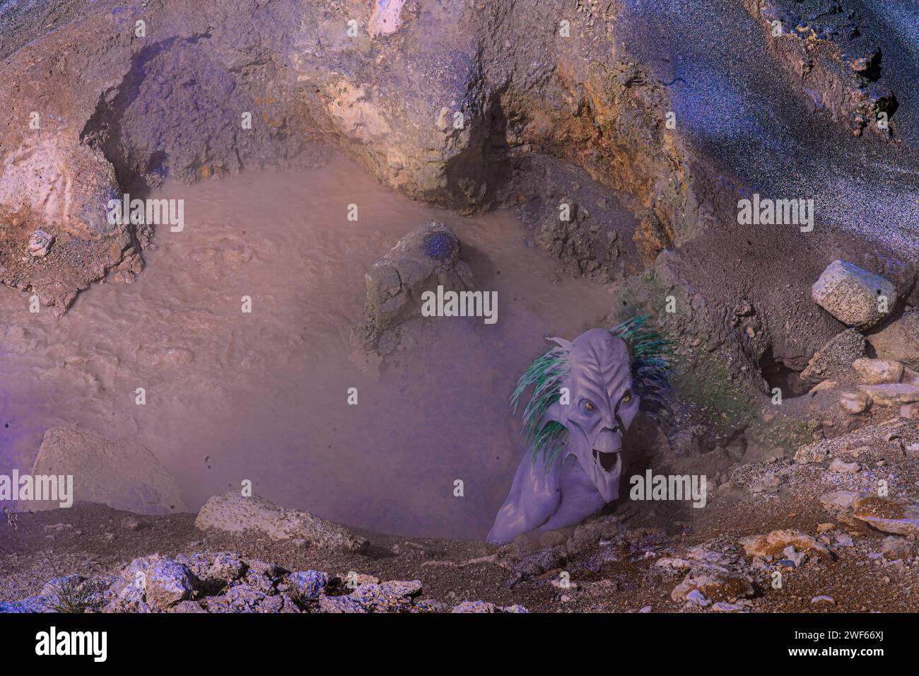 Alien book cover shows an AI image head & body emerging from mud volcano pond with rocks. Photo image is of Yellowstone volcanic rock. Alien added. Stock Photo