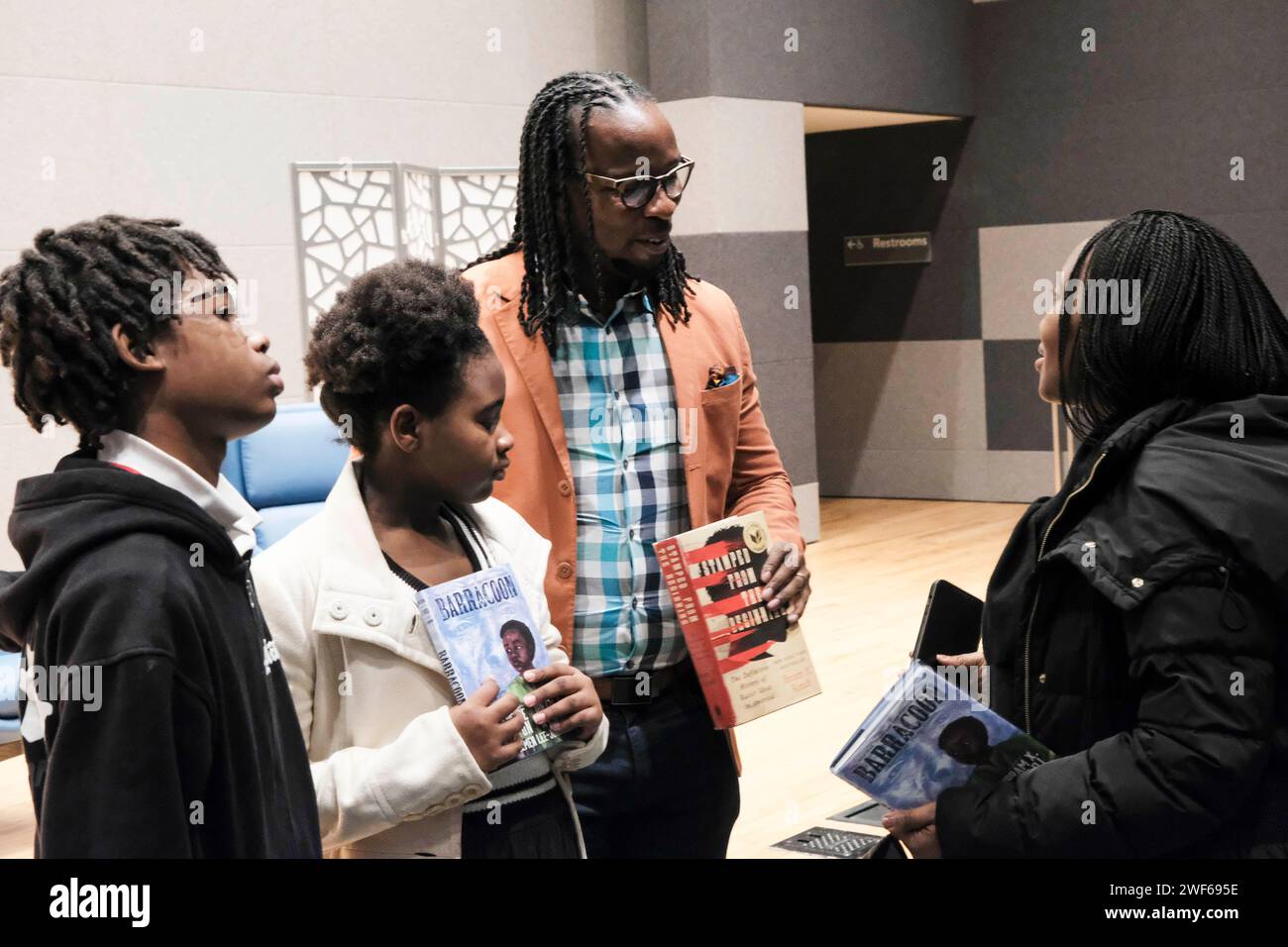 Atlanta, Georgia, USA. 28th Jan, 2024. Author and anti-racist scholar Ibram X Kendi speaks with an attendee at an event in Atlanta where Kendi shared the release of his new book ''Barracoon'', which is an adaptation of Zora Neale Hurston's book of the same title. Kendi's adaptation contain's language that caters to younger readers. (Credit Image: © John Arthur Brown/ZUMA Press Wire) EDITORIAL USAGE ONLY! Not for Commercial USAGE! Credit: ZUMA Press, Inc./Alamy Live News Stock Photo