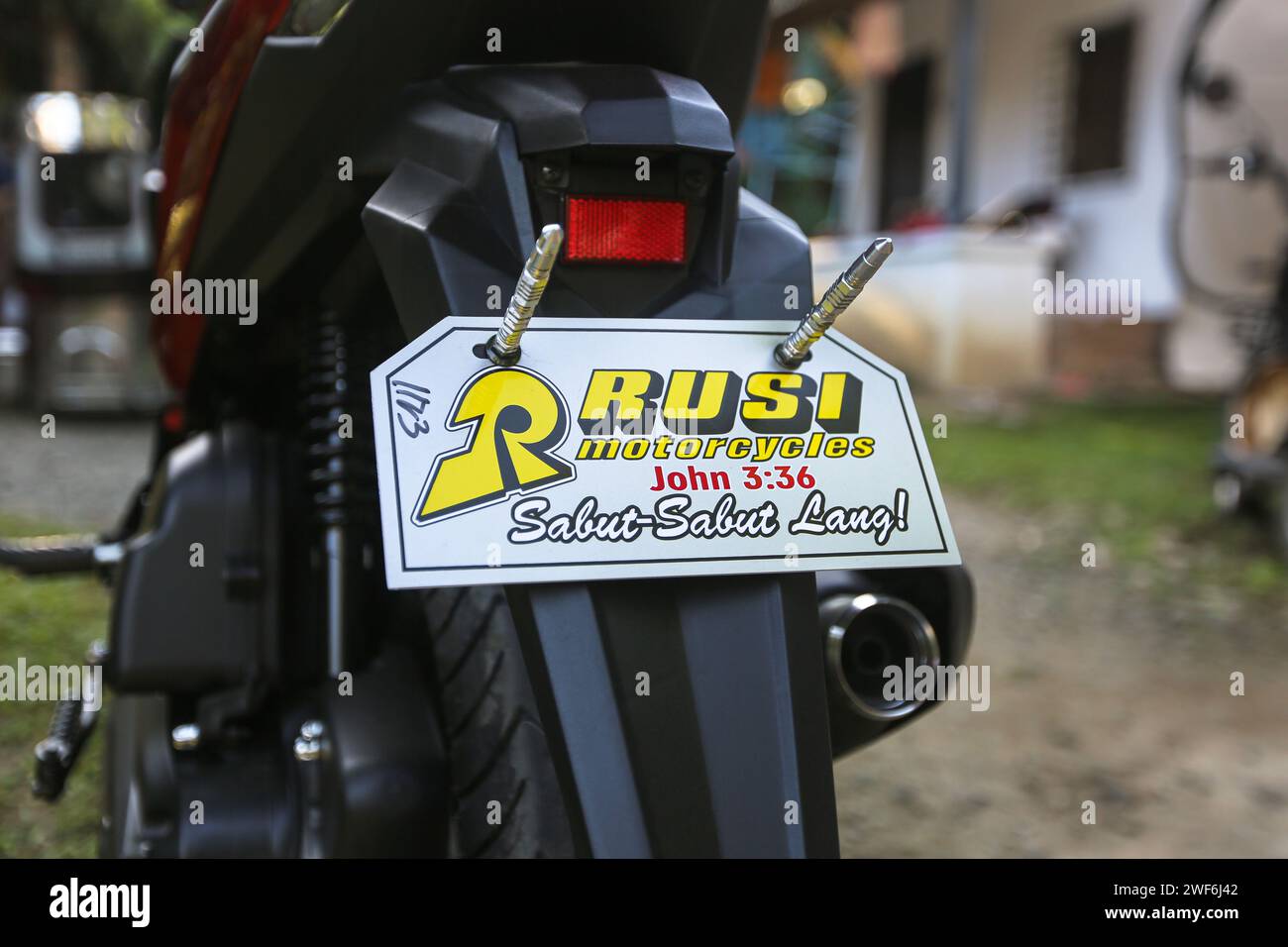 Temporary registration plate of RUSI Motors Company in Philippines, Philippine motorcycles, scooters, bikes local dealership brand, China manufactured Stock Photo