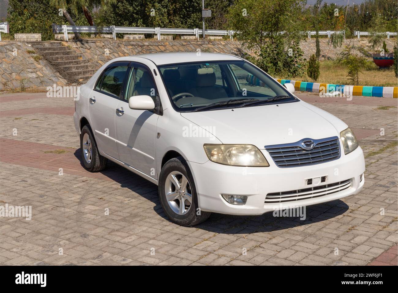 Toyota corolla 2006 car: Swat, Pakistan - 10 October 2023. Stock Photo