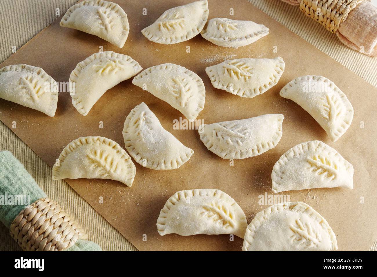 Delicate Dumpling Medley on a Vibrant Wooden Palette Stock Photo