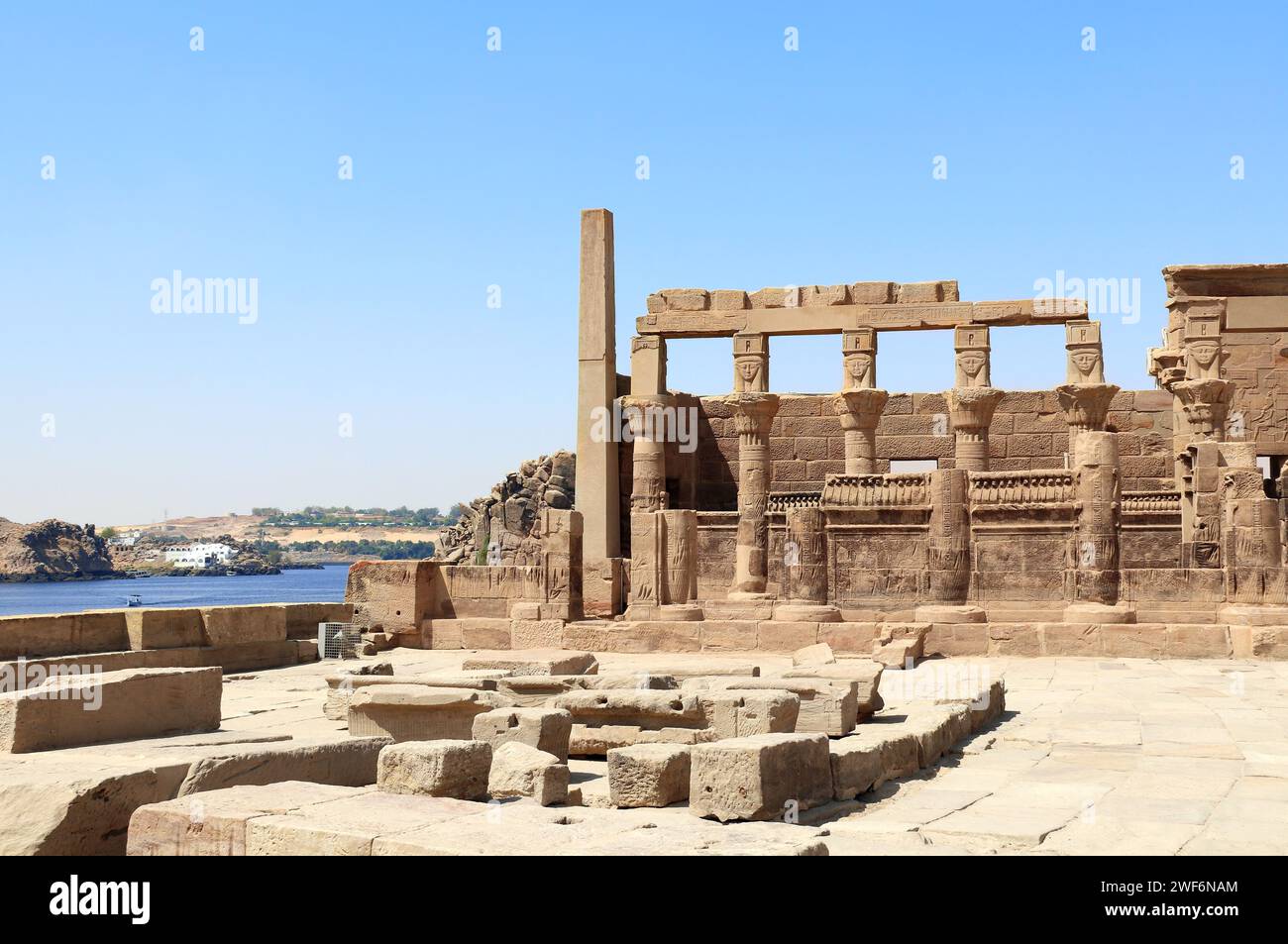 Temple of Isis on Agilkia Island (Philae) and Nile river, reservoir of Aswan Low Dam, Egypt. Summer vacation, relaxing on cruise ships Stock Photo