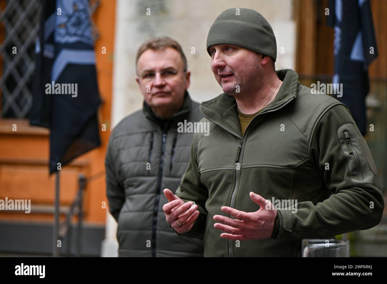 LVIV, UKRAINE - JANUARY 26, 2024 - Head of Lviv Regional Center for Recruitment and Social Support Colonel Artur Niiazov and Lviv Mayor Andrii Sadovyi (R) are pictured during the opening ceremony of the first recruitment center of the 1st separate battalion of Da Vinci Wolves named after Dmytro Kotsiubailo in Lviv, western Ukraine. Stock Photo