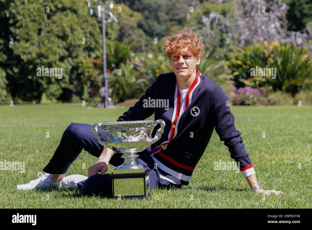 Jannik Sinner of Italy poses with the Norman Brookes Challenge Cup after winning the 2024 Australian Open Final, at the Royal Botanic Gardens on January 29, 2024 in Melbourne, Australia Stock Photo