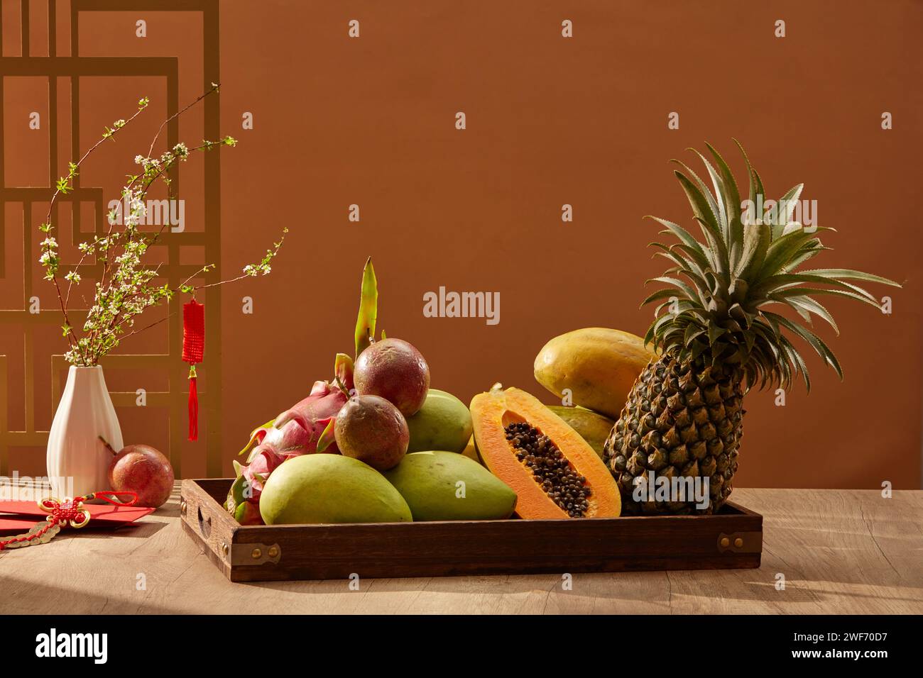 Front view of fruit trays on wooden table in the first day of year on
