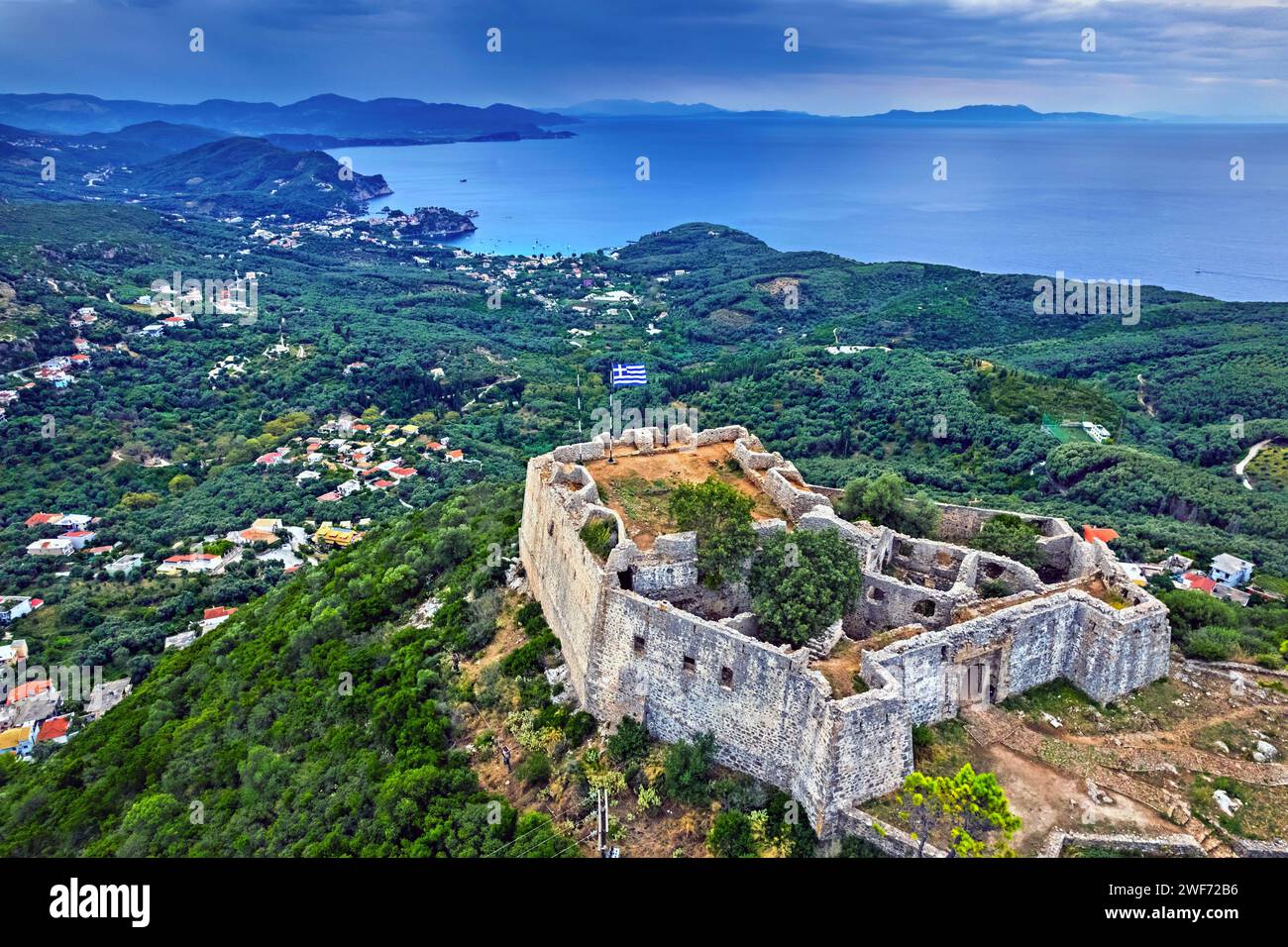 The Ali Pasha castle (also known as 'Castle of Anthoussa'), close to Anthoussa village. In the background, Parga town. Preveza, Epirus, Greece. Stock Photo