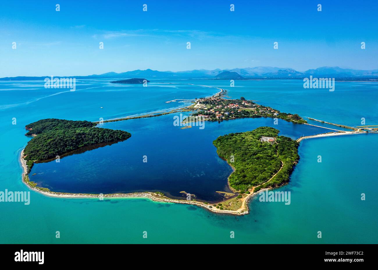 This is not some kind of atoll in the Indian or the Pacific Ocean. It is Koronissia island in the Ambracian ('Amvrakikos') gulf, Arta, Epirus, Greece. Stock Photo