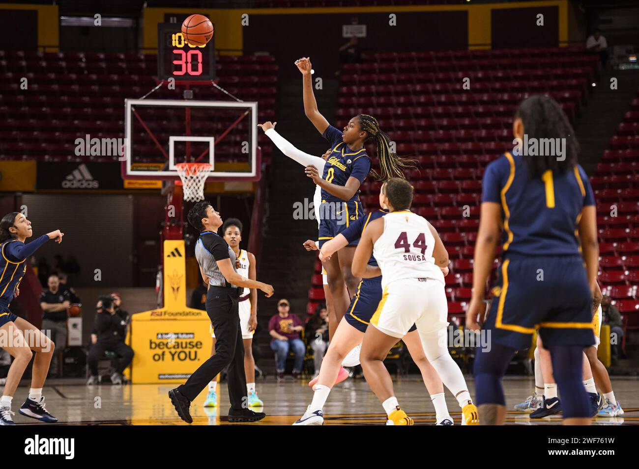 California Golden Bears forward Ugonne Onyiah (0) wins the opening tip in the first half of the NCAA basketball game against Arizona State Sun Devils Stock Photo