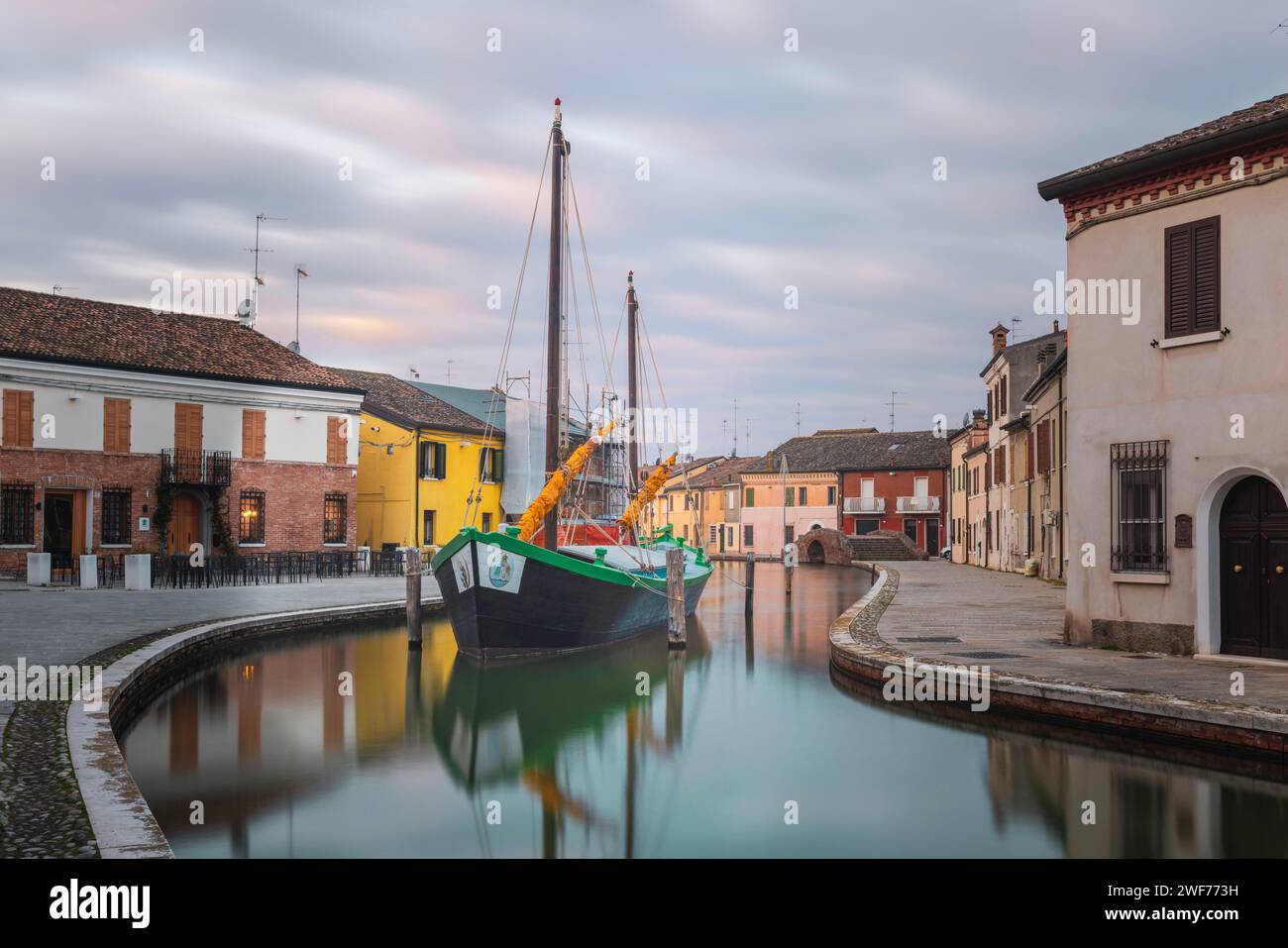 The venetian-style town of Comacchio with its canals and bridges in the province of Ferrara, Emilia-Romagna, Italy. Stock Photo