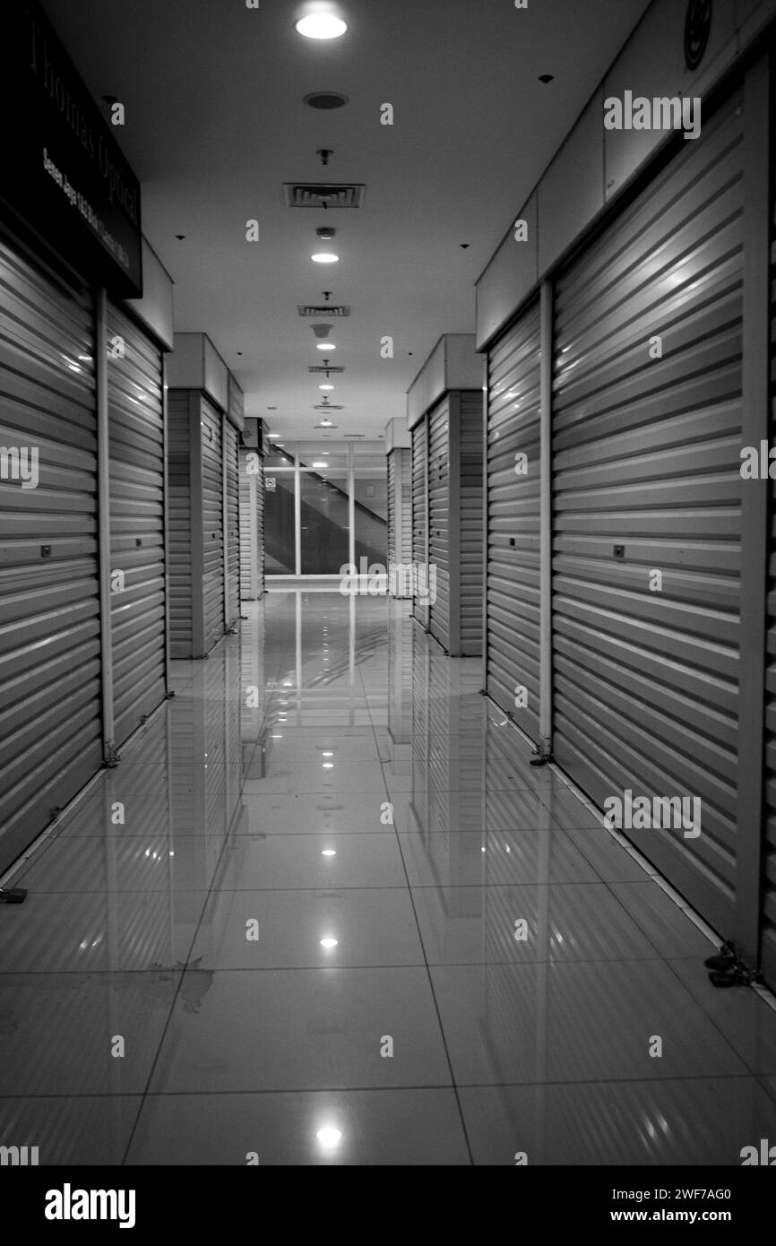 Shop closed in a empty shopping district Stock Photo