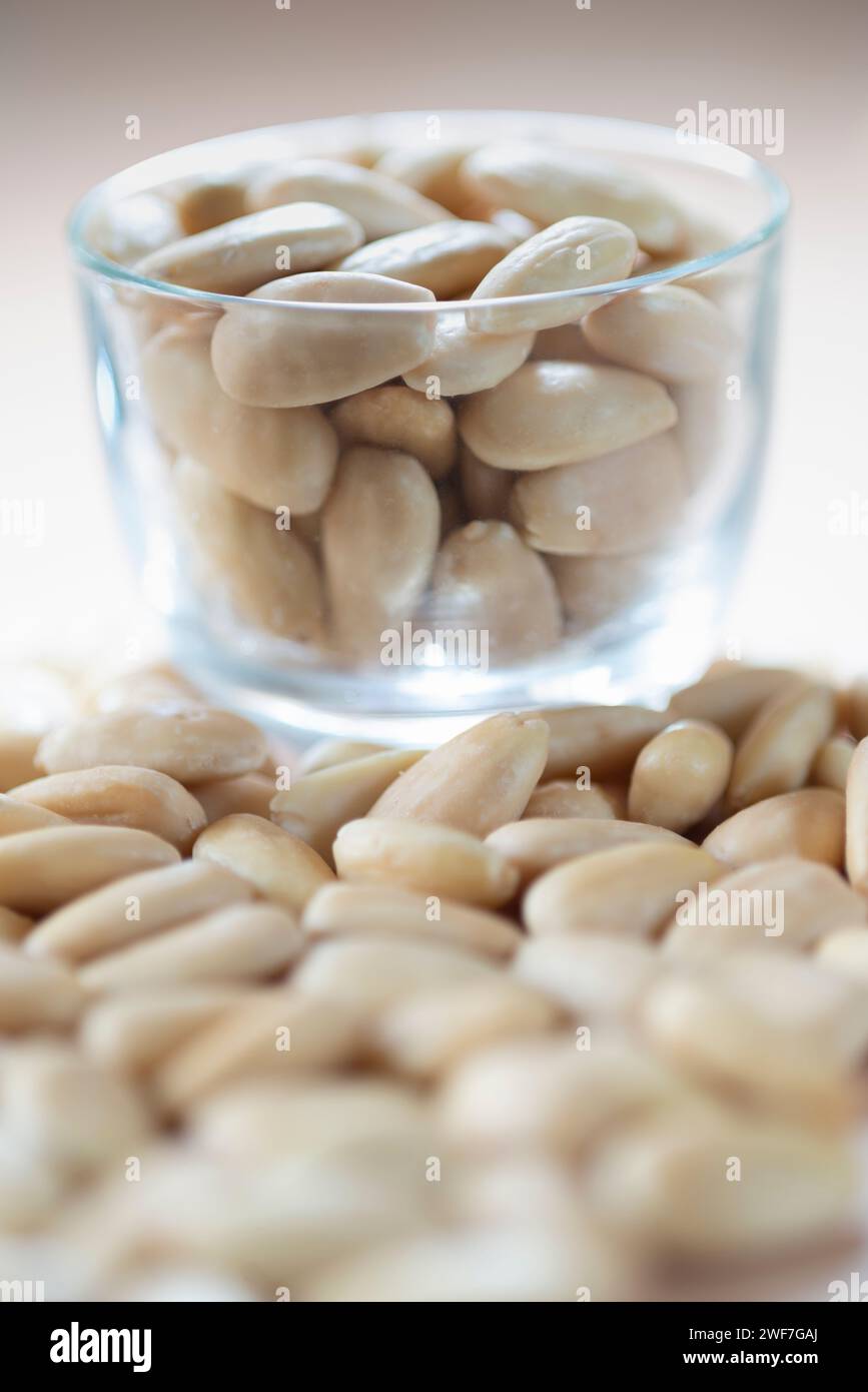 Peeled  Almonds in Transparent Bowl Stock Photo
