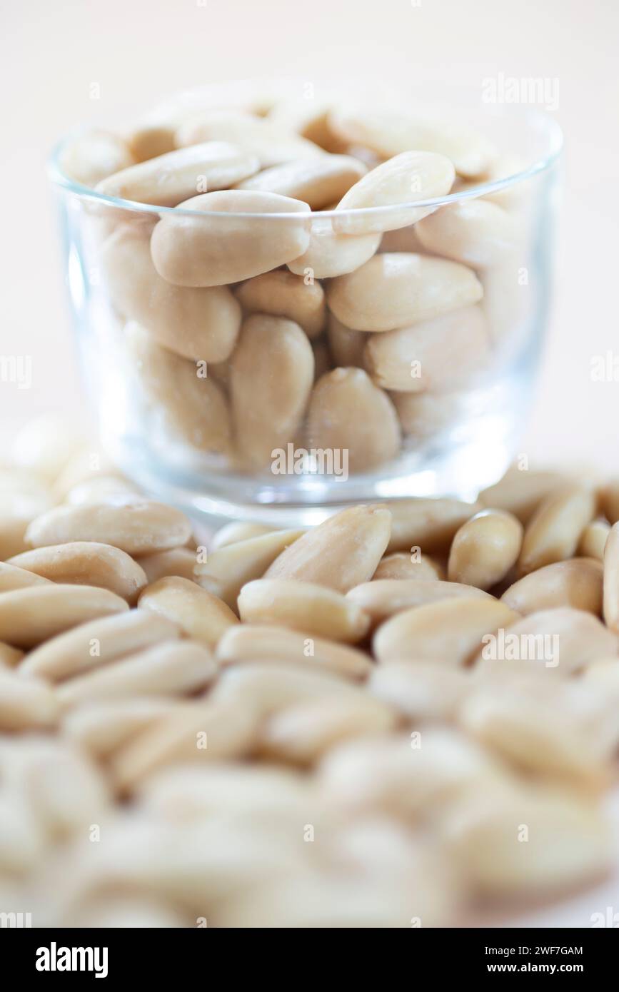 Peeled  Almonds in Transparent Bowl Stock Photo