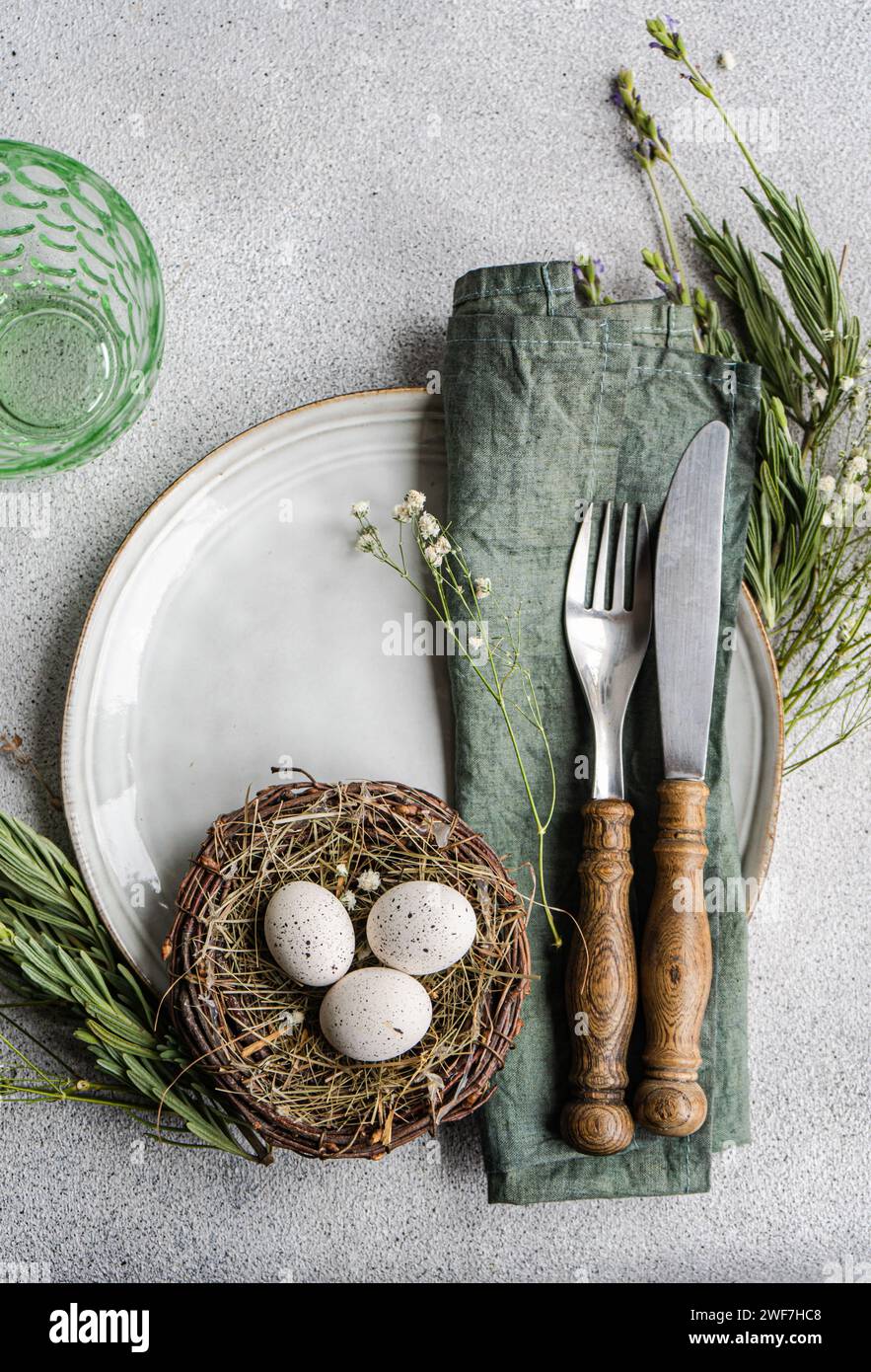 easter table setting with nest Stock Photo