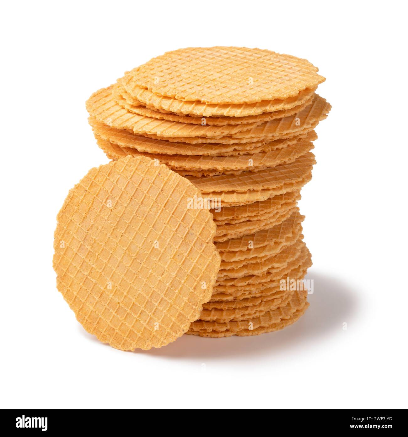 Stack of fresh homemade baked thin cheese waffles isolated on white background close up Stock Photo