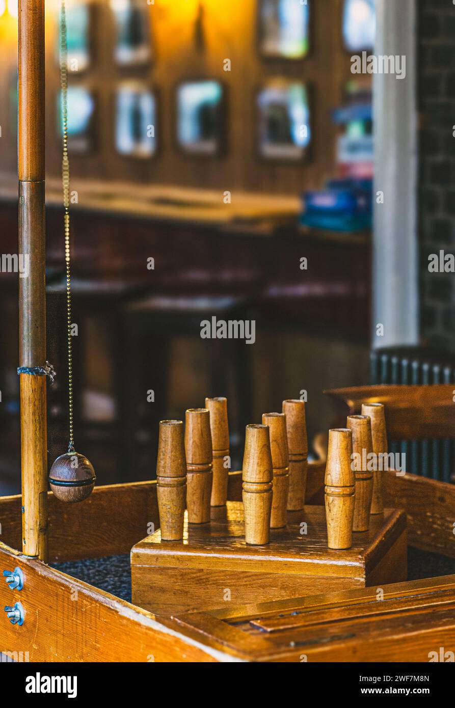 Pub in London with bar skittles a hand-crafted bar game. Stock Photo