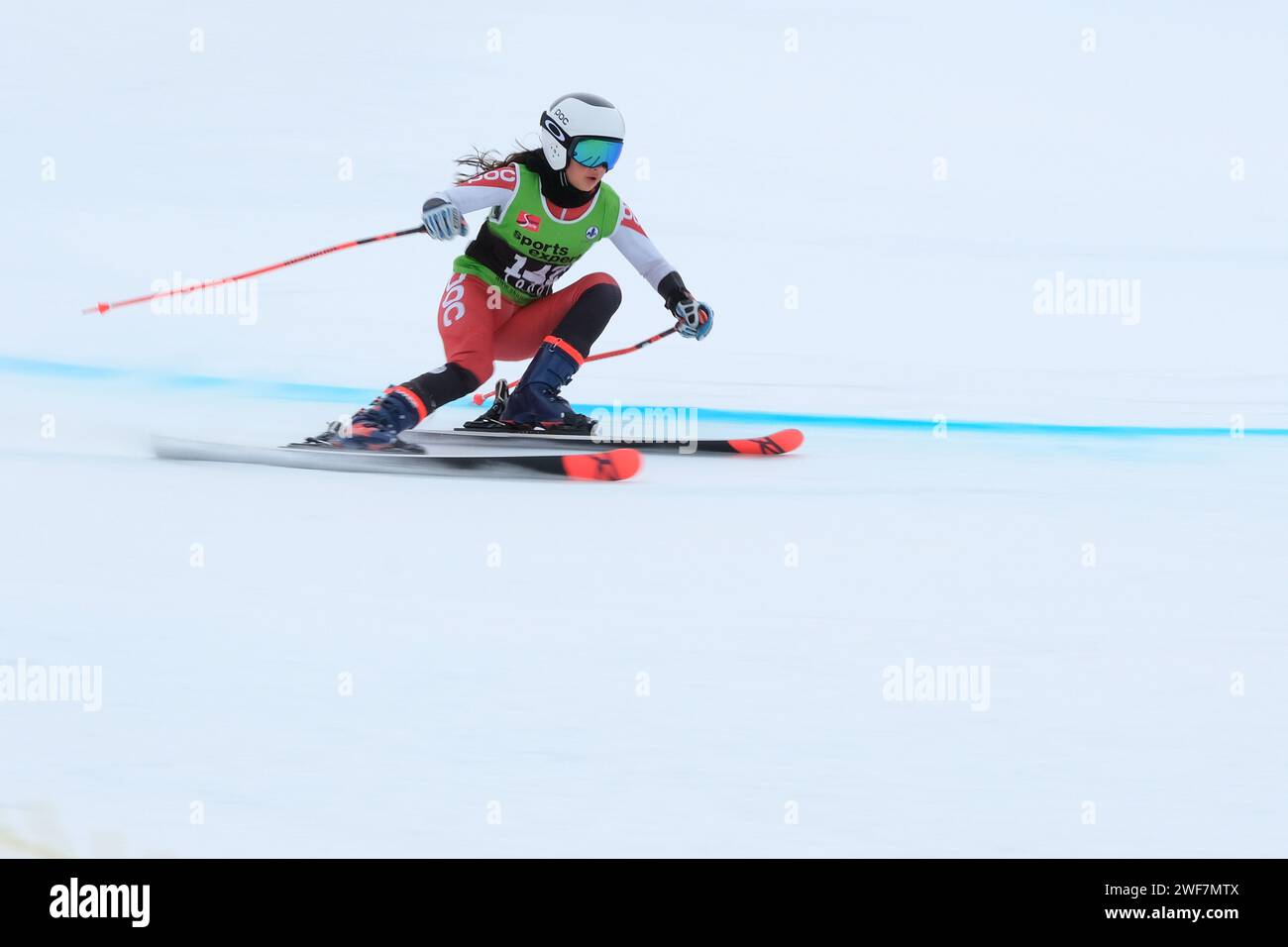 A ski racer competing in Quebec Super Series Giant Slalom race at Mont Ste Marie, Quebec Stock Photo