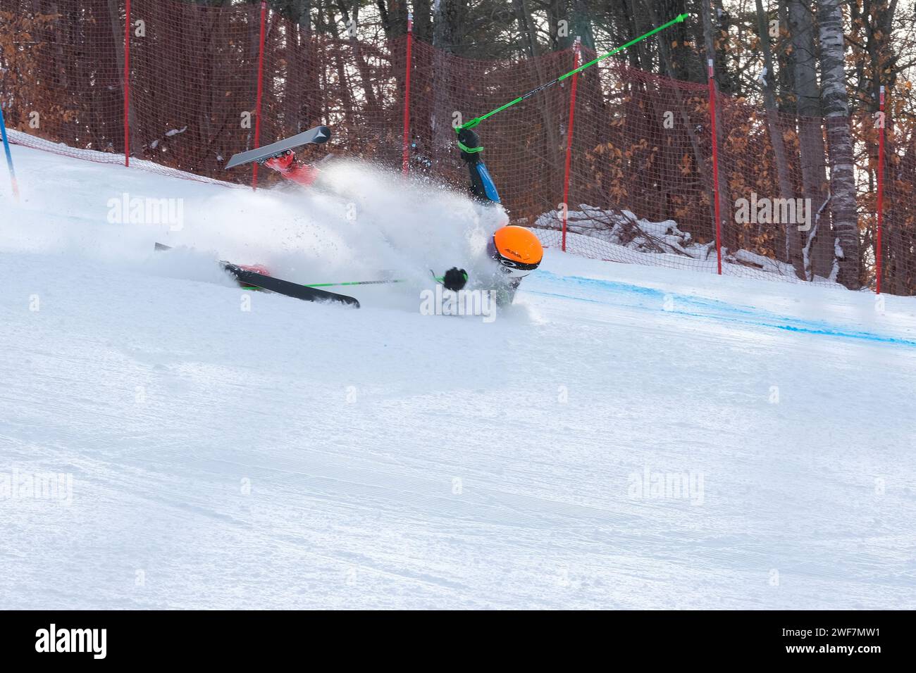A ski racer competing in Quebec Super Series Giant Slalom race at Mont Ste Marie, Quebec Stock Photo