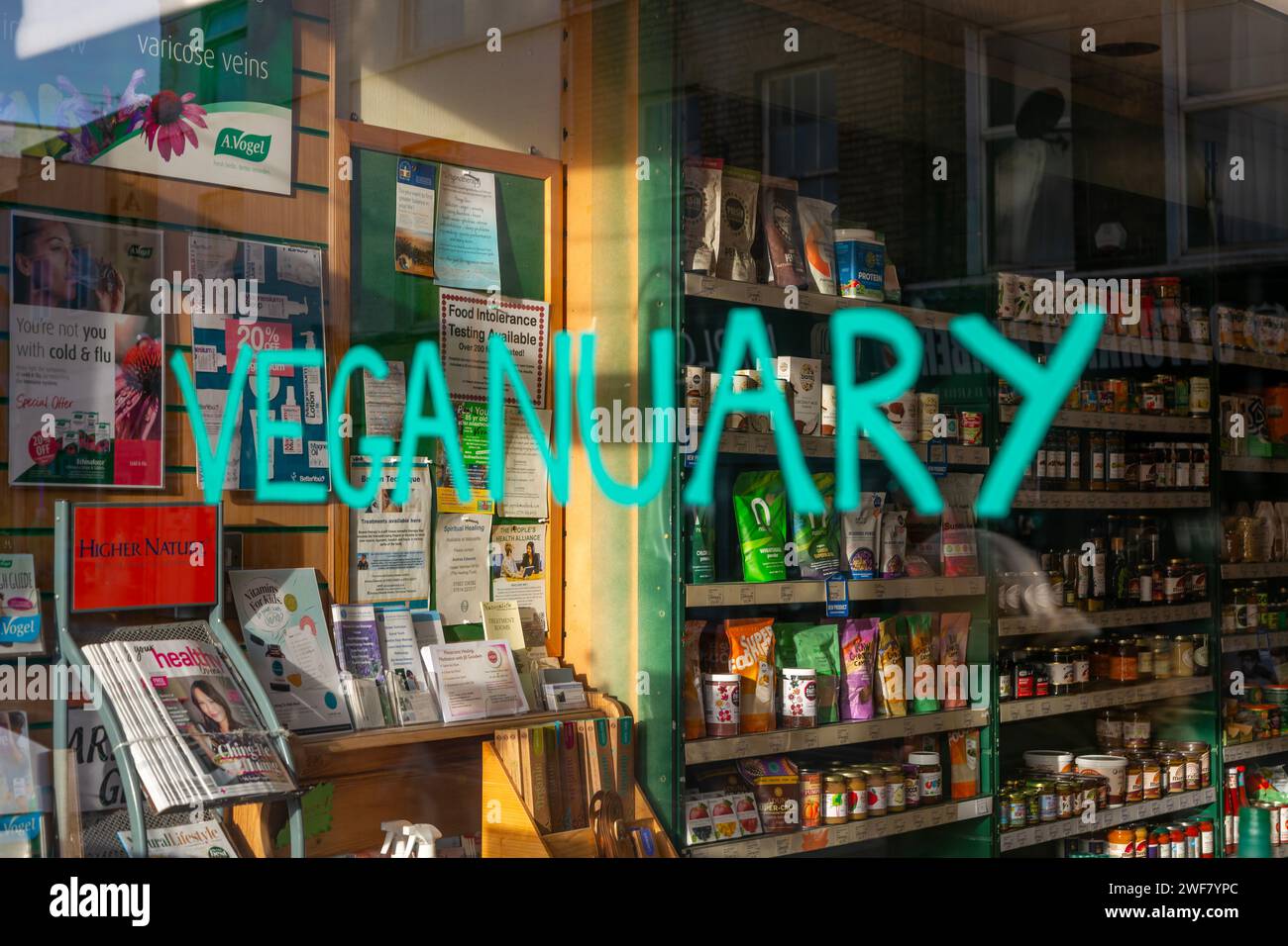 Veganuary sign in shop window whole food shop, Naturalife  Taunton, Somerset, England, UK Stock Photo