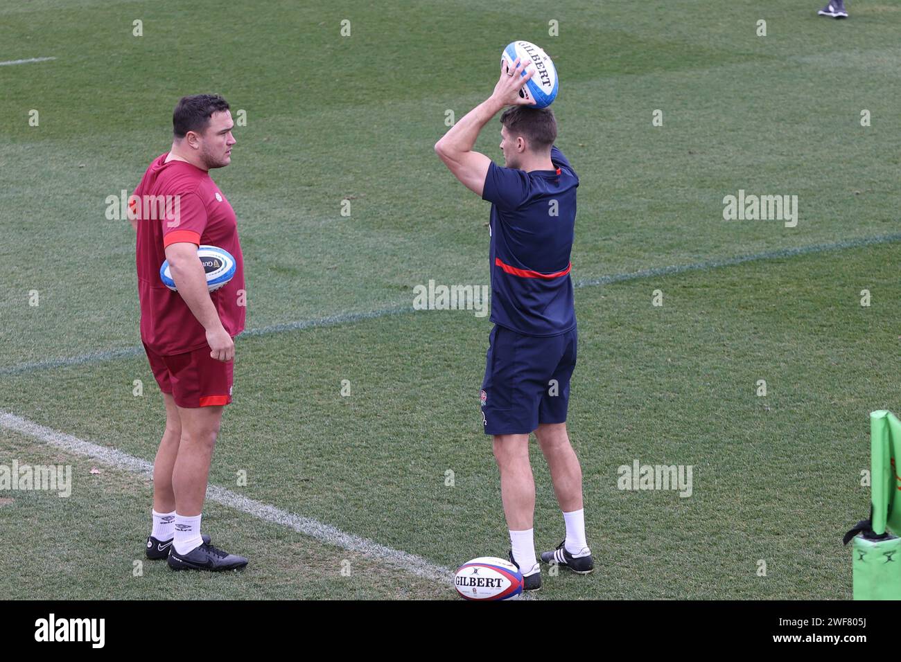 Girona, Spain, 29th January 2024, England captain Jamie George talking to attack coach Richard Wigglesworth at England men's rugby training camp Stock Photo