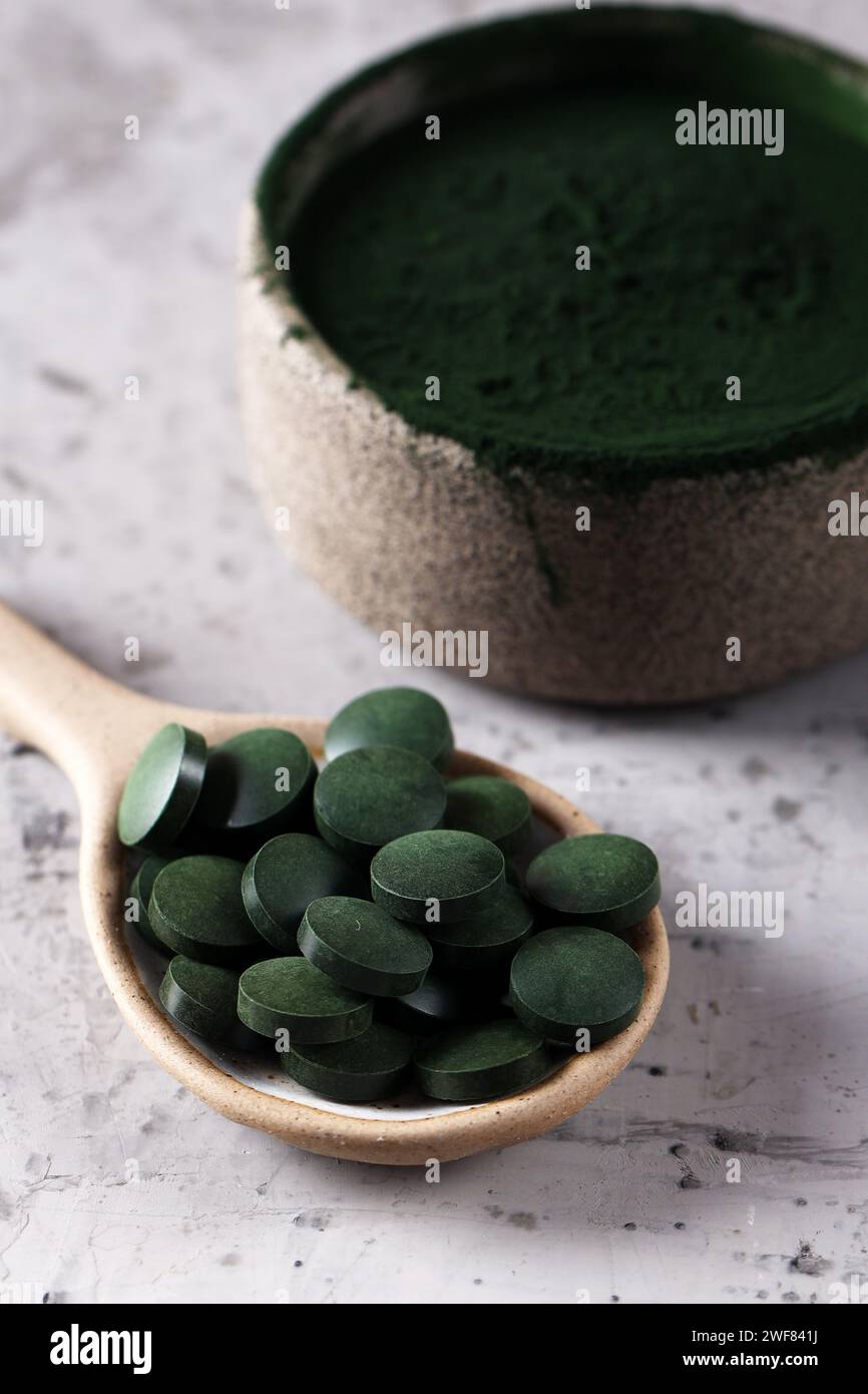 Eating Powder superfood spirulina in tablets and powder, healthy eating Stock Photo ...
