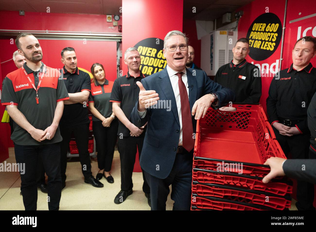 Labour leader Sir Keir Starmer meets staff with executive chairman of Iceland supermarket, Richard Walker, during a visit to an Iceland store in Warrington. Mr Walker has given his backing to Labour, saying the party was the 'right choice' for business and voters. Picture date: Monday January 29, 2024. Stock Photo