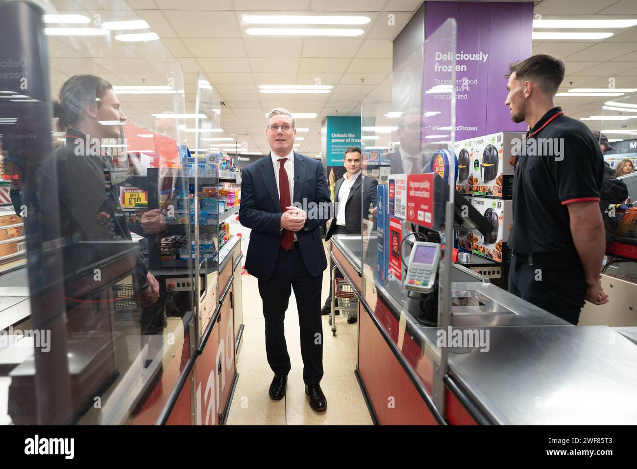Labour leader Sir Keir Starmer with executive chairman of Iceland supermarket, Richard Walker, during a visit to an Iceland store in Warrington. Mr Walker has given his backing to Labour, saying the party was the 'right choice' for business and voters. Picture date: Monday January 29, 2024. Stock Photo