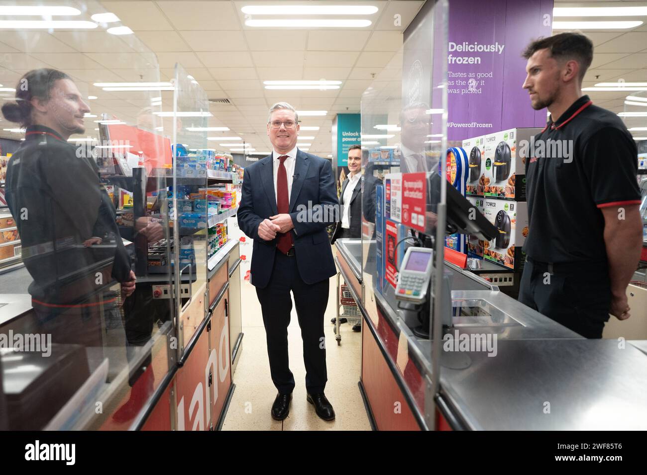 Labour leader Sir Keir Starmer with executive chairman of Iceland supermarket, Richard Walker, during a visit to an Iceland store in Warrington. Mr Walker has given his backing to Labour, saying the party was the 'right choice' for business and voters. Picture date: Monday January 29, 2024. Stock Photo