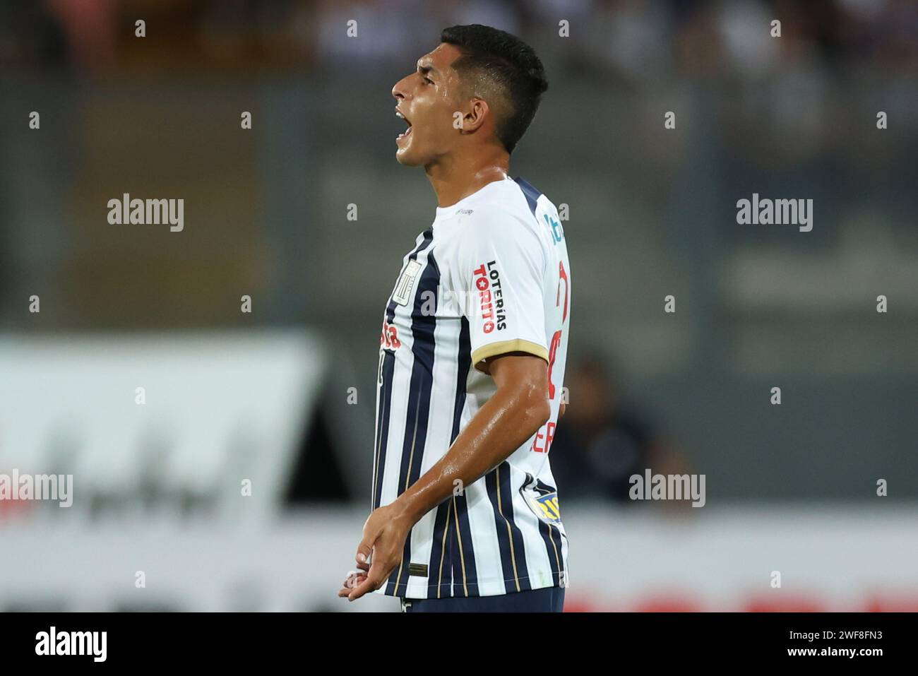 Kevin Serna of Alianza Lima during the Liga 1 match between Alianza de Lima and Cesar Vallejo played at Nacional Stadium on January 28, 2024 in Lima, Peru. (Photo by Miguel Marrufo / PRESSINPHOTO) Stock Photo