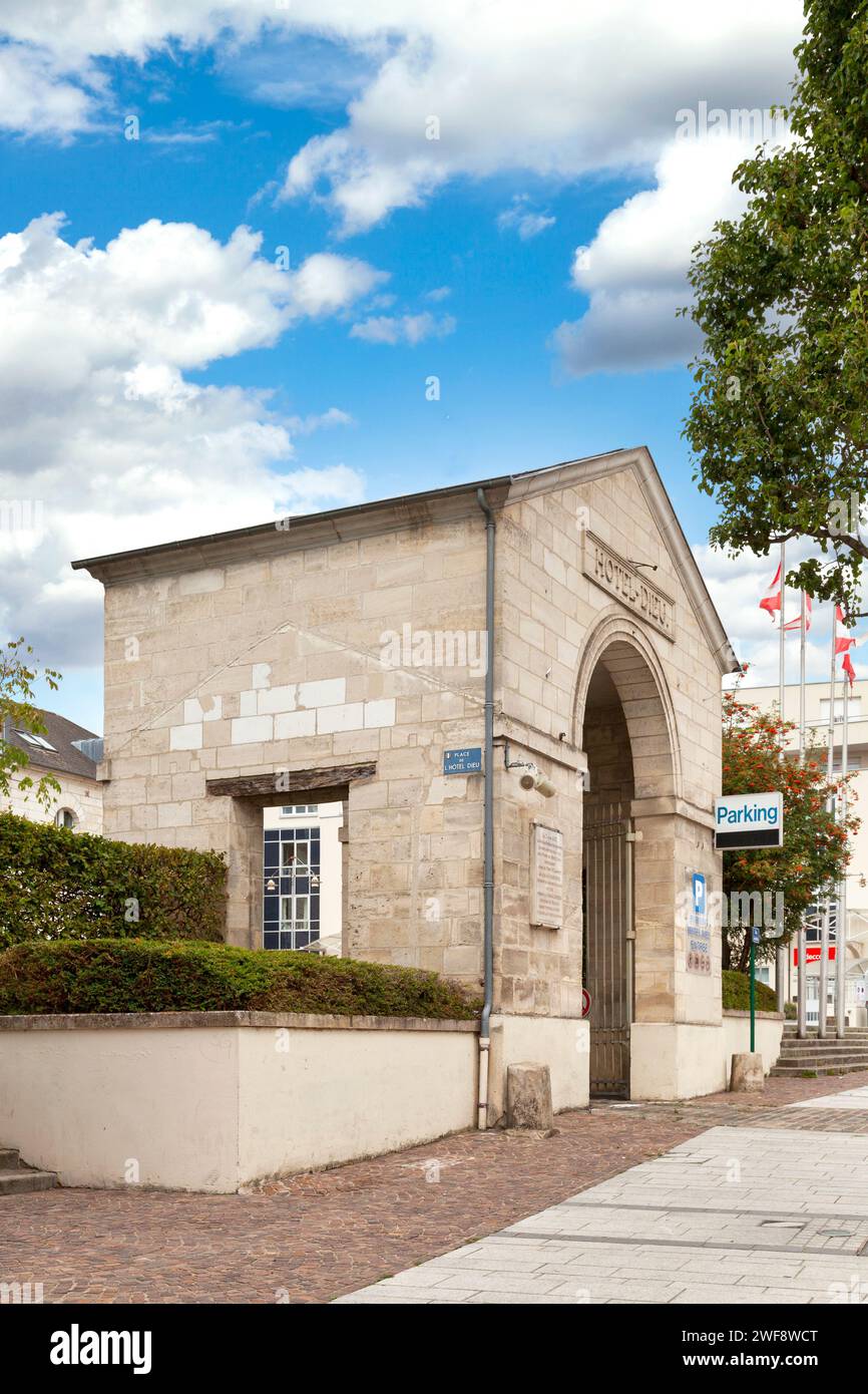 Beauvais, France - August 24 2020: Former entrance of the Hôtel-Dieu of Beauvais. In French-speaking countries, a hôtel-Dieu (English: hostel of God) Stock Photo