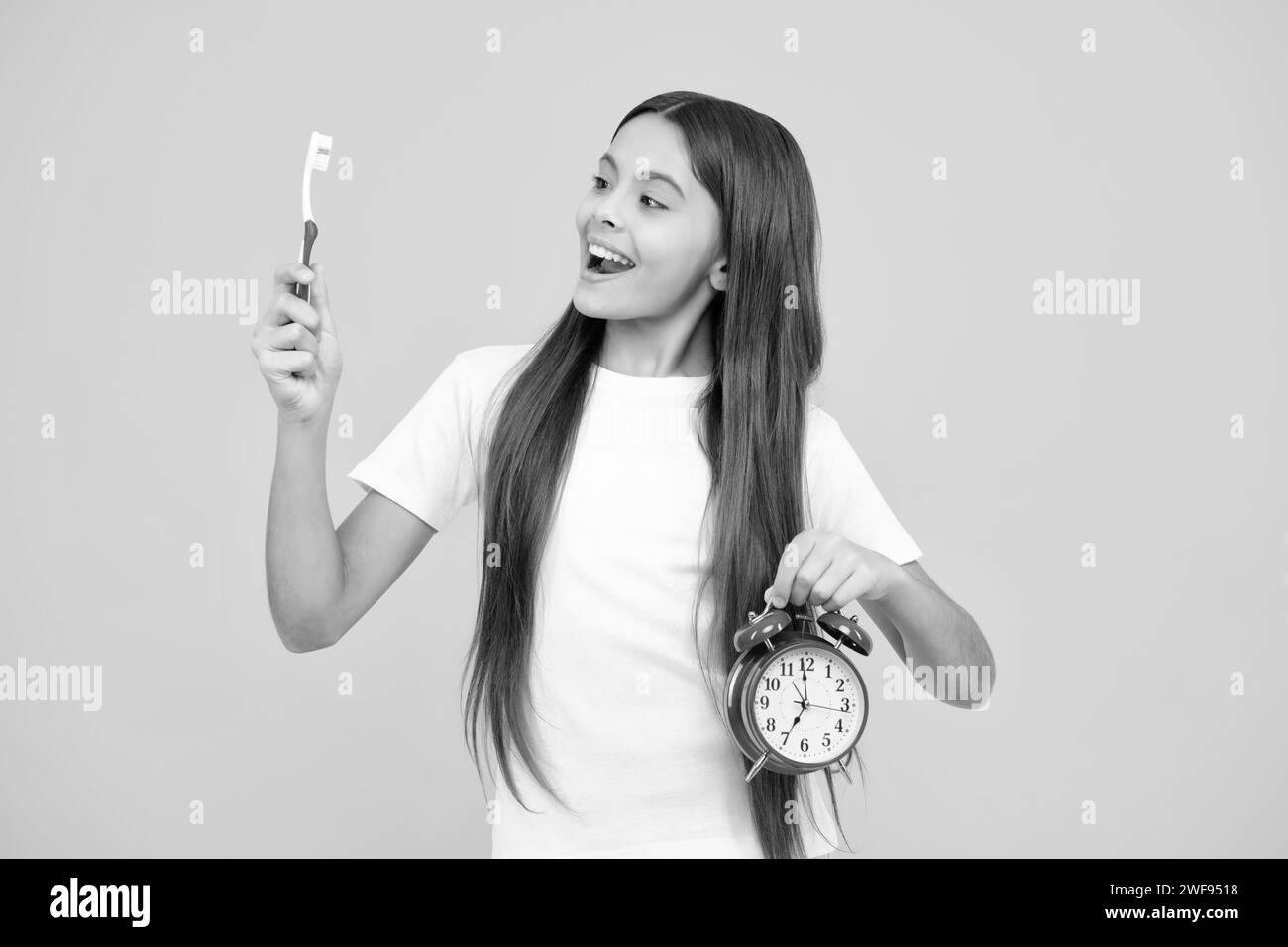 Girl cleaning teeth. Kid brushing teeth with brush. Dental hygiene