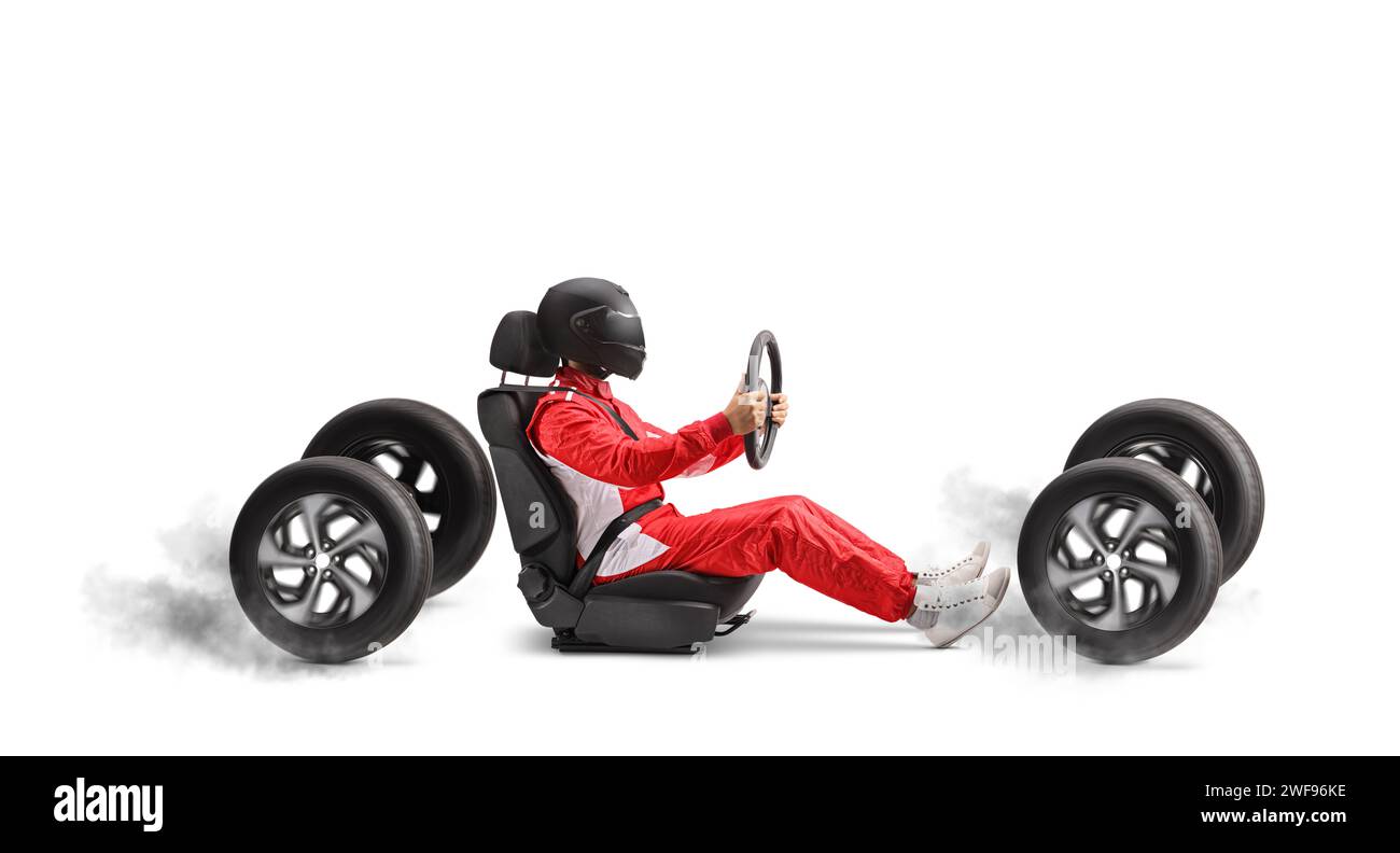 Racer in a car seat holding a steering wheel and driving fast isolated on white background Stock Photo