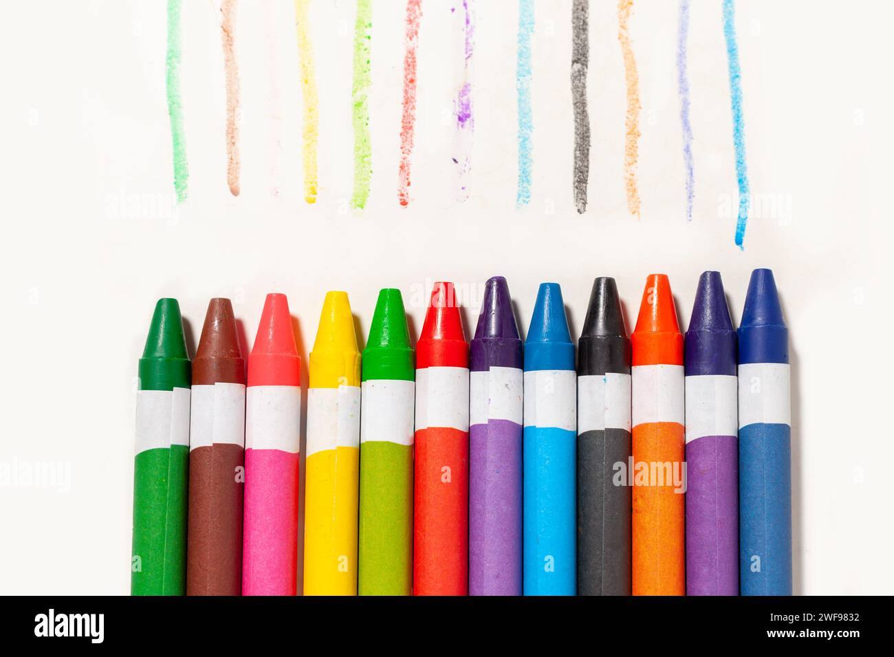 many colorful crayons isolated on white Stock Photo