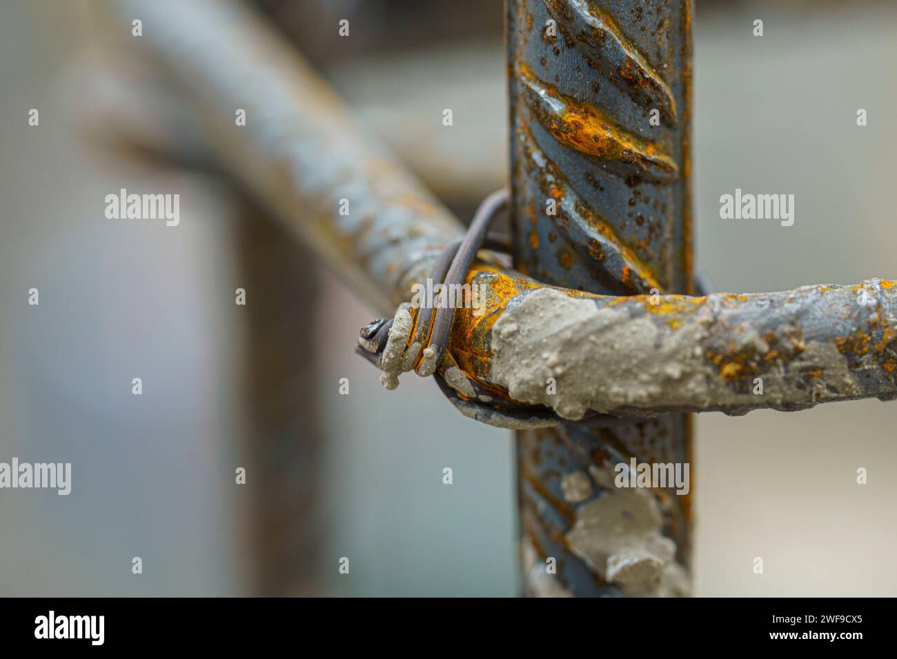 Rusty wire exposed as handle and rope bend downwards Stock Photo
