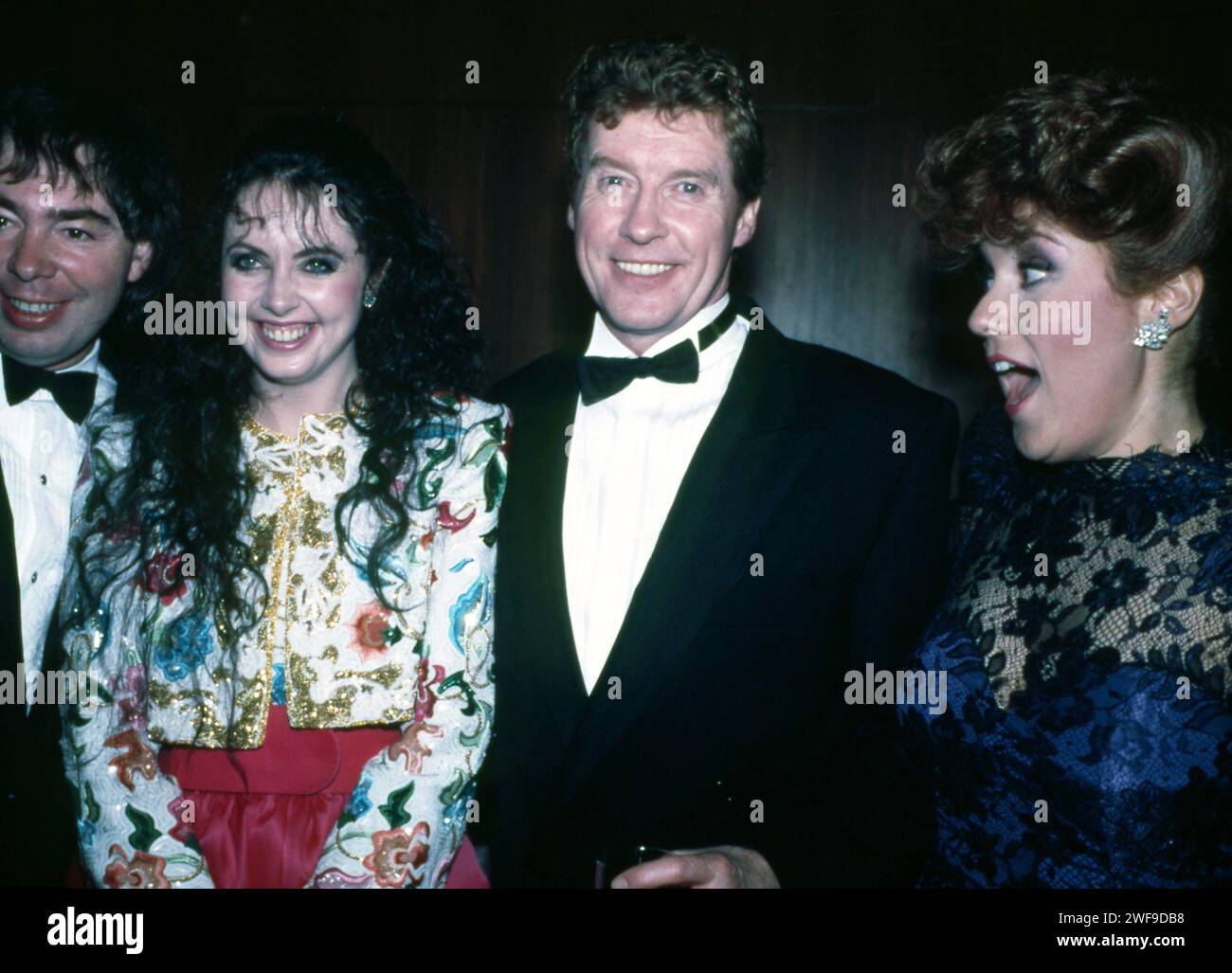 Andew Lloyd Weber (left), Sarah Brightman (second from left), and Michael Crawford at the opening of Phantom of the Opera, at the Beekman Theatre in New York, Jan. 1988.  Photo: Oscar Abolafia/Everett Collection  (michaelcrawford001) Stock Photo